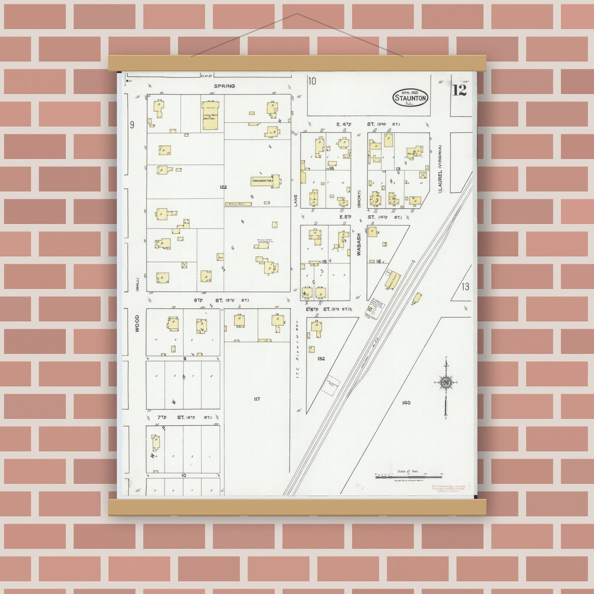 Old map wall art mockup — magnetic wood frame on brick wall — Sanborn Fire Insurance Map from Staunton, Macoupin County, Illinois (1921), Sheet #0012
