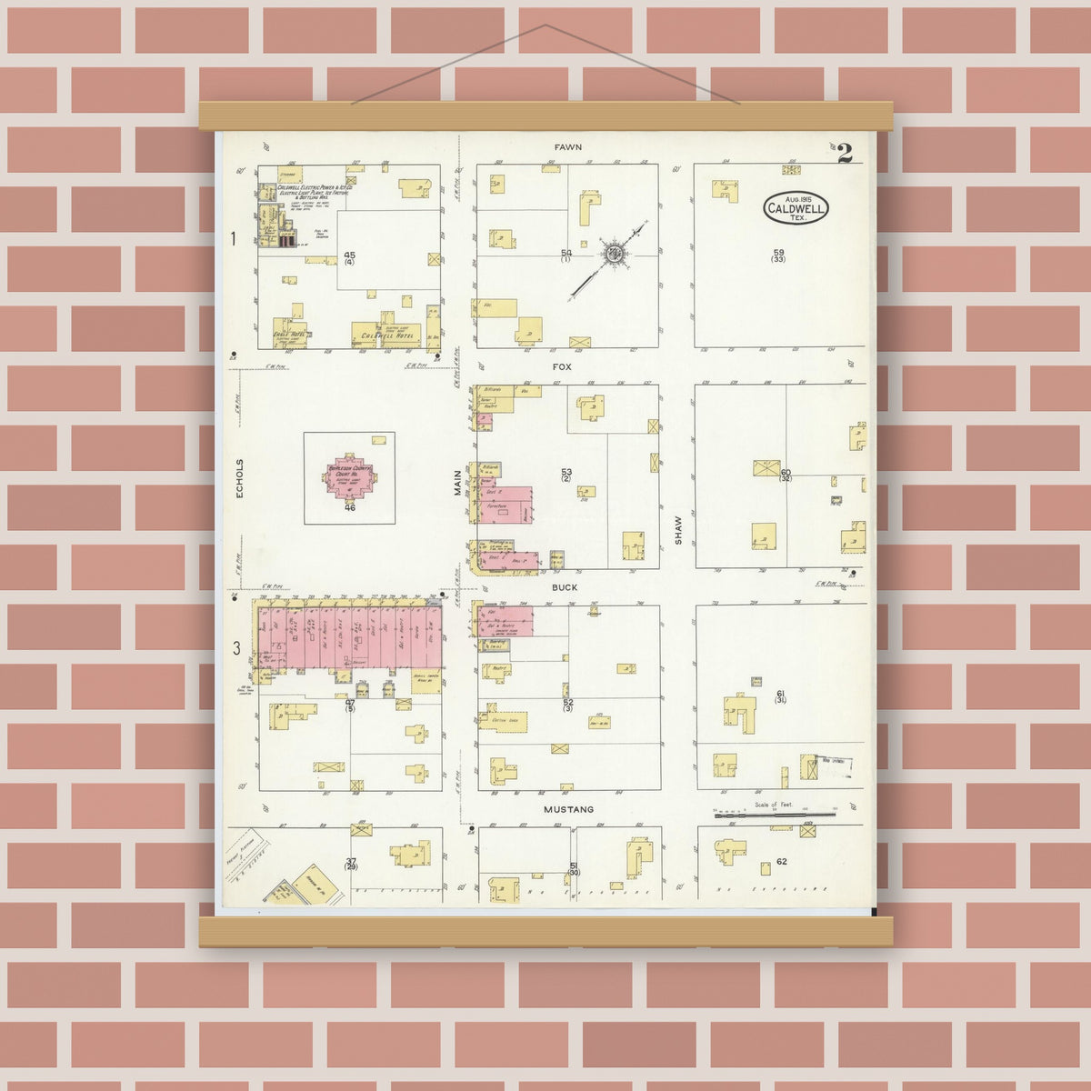 Old map wall art mockup — magnetic wood frame on brick wall — Sanborn Fire Insurance Map from Caldwell, Burleson County, Texas (1915), Sheet #0002