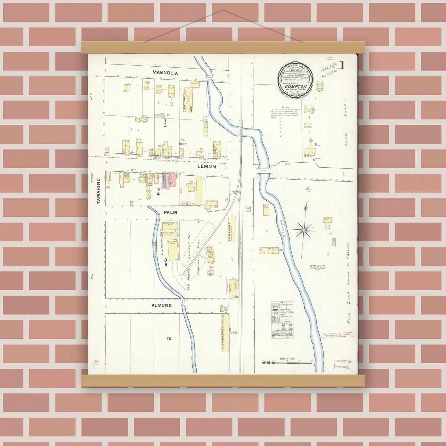 Old map wall art mockup — magnetic wood frame on brick wall — Sanborn Fire Insurance Map from Compton, Los Angeles County, California (1891), Sheet #0001