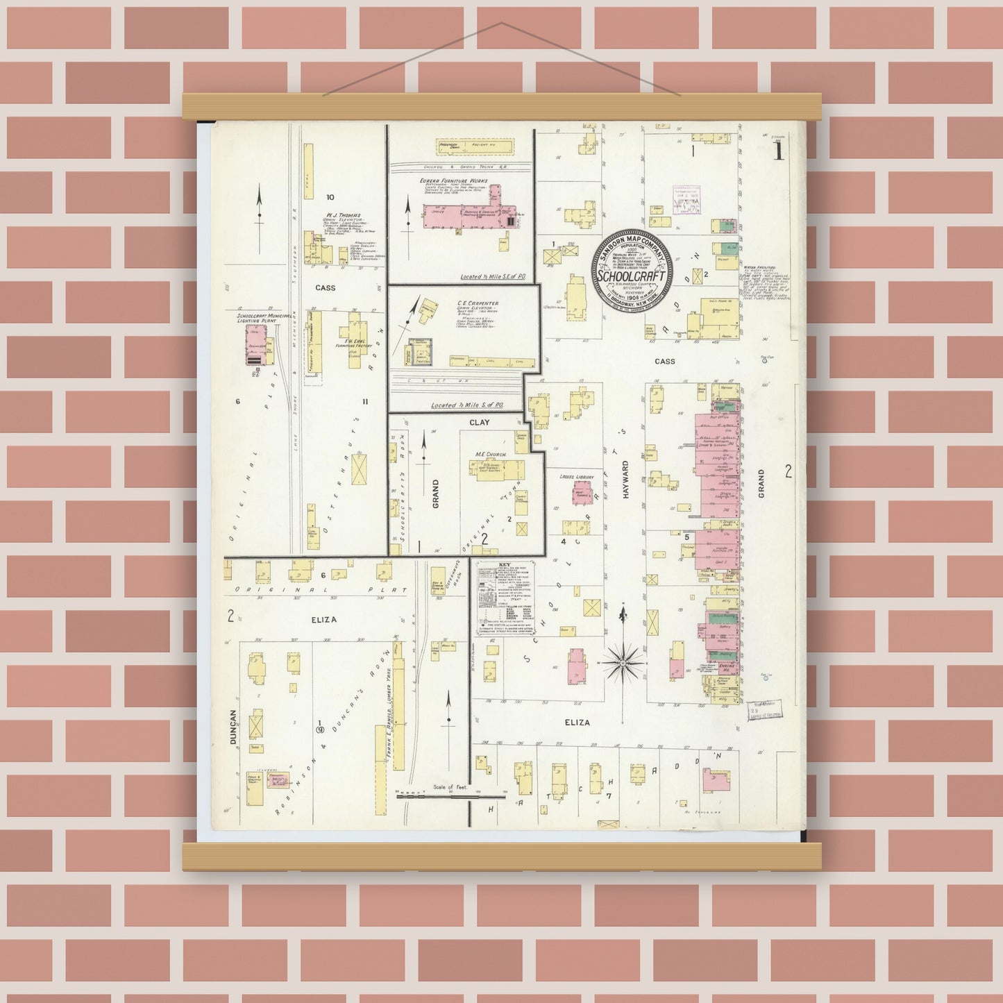 Old map wall art mockup — magnetic wood frame on brick wall — Sanborn Fire Insurance Map from Schoolcraft, Kalamazoo County, Michigan (1908), Sheet #0001