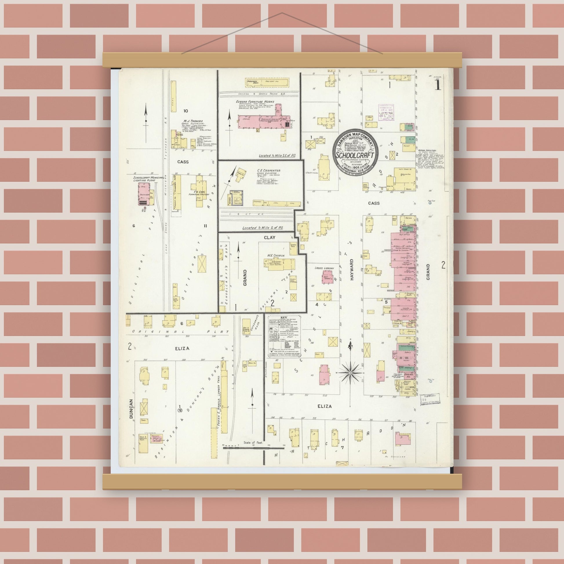 Old map wall art mockup — magnetic wood frame on brick wall — Sanborn Fire Insurance Map from Schoolcraft, Kalamazoo County, Michigan (1908), Sheet #0001