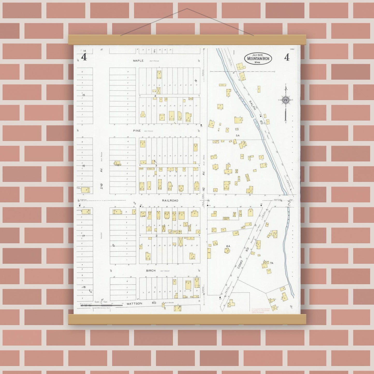 Old map wall art mockup — magnetic wood frame on brick wall — Sanborn Fire Insurance Map from Mountain Iron, Saint Louis County, Minnesota (1928), Sheet #0004