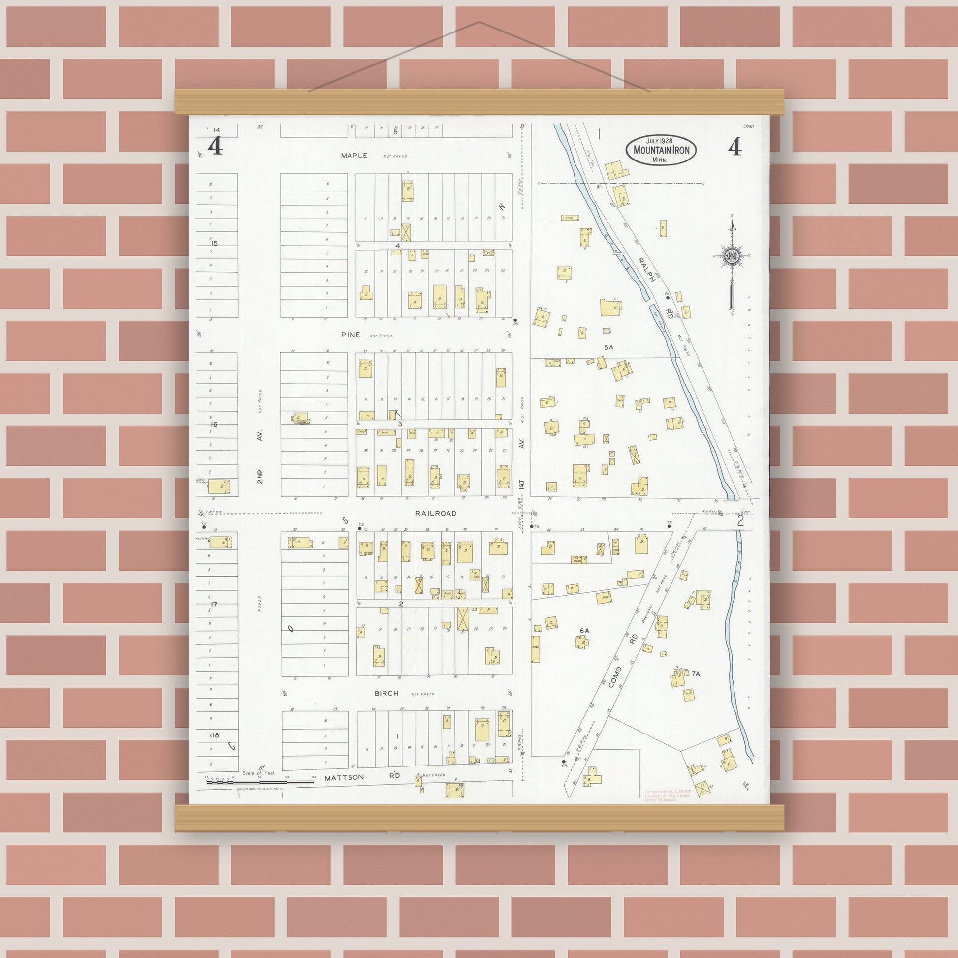 Old map wall art mockup — magnetic wood frame on brick wall — Sanborn Fire Insurance Map from Mountain Iron, Saint Louis County, Minnesota (1928), Sheet #0004