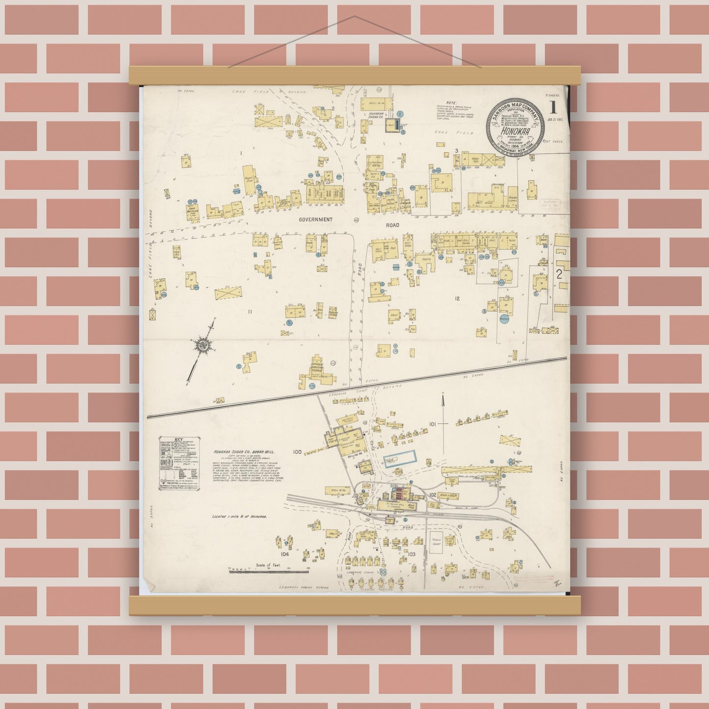 Old map wall art mockup — magnetic wood frame on brick wall — Sanborn Fire Insurance Map from Honokaa, Hawaii County, Hawaii (1914), Sheet #0001