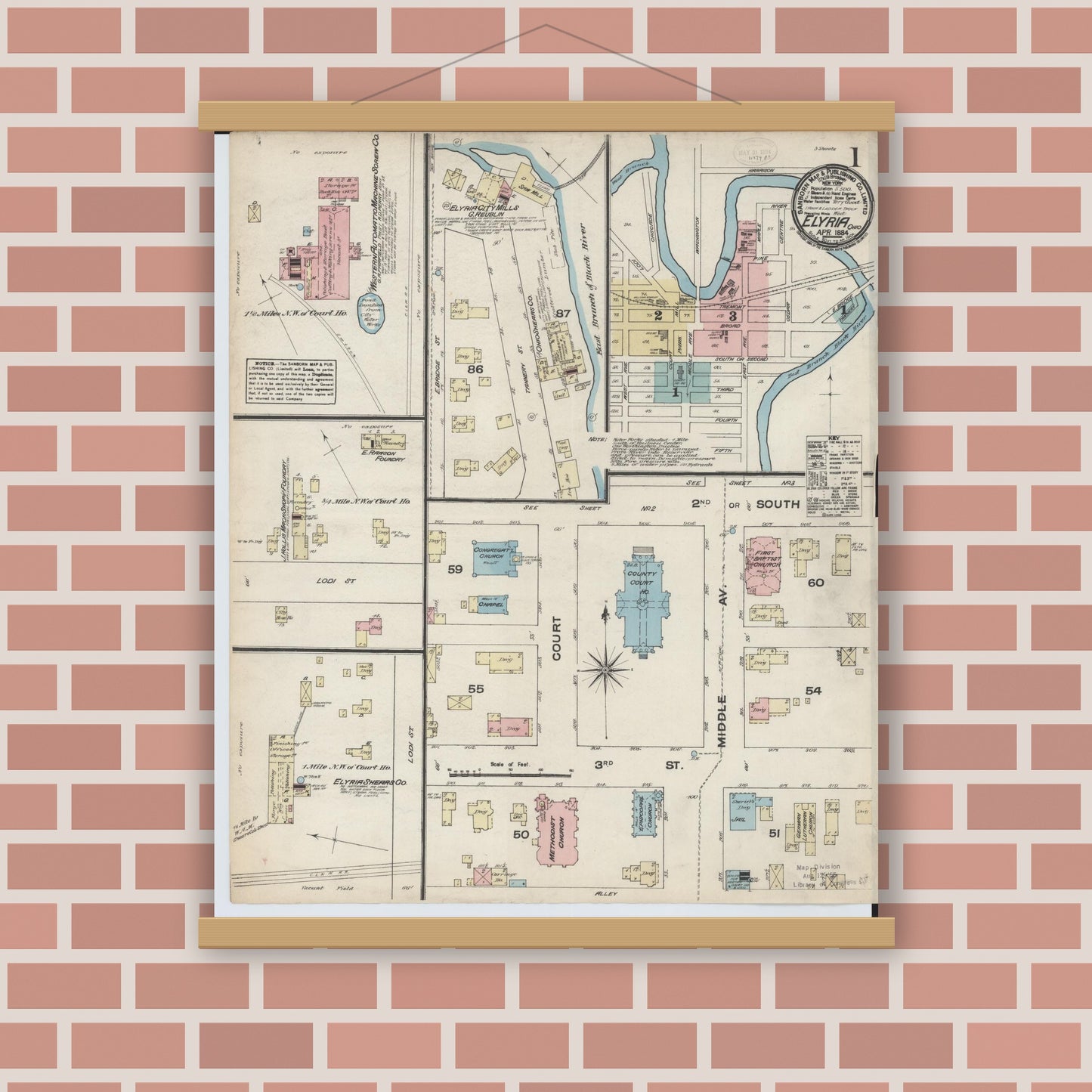 Old map wall art mockup — magnetic wood frame on brick wall — Sanborn Fire Insurance Map from Elyria, Lorain County, Ohio (1884), Sheet #0001