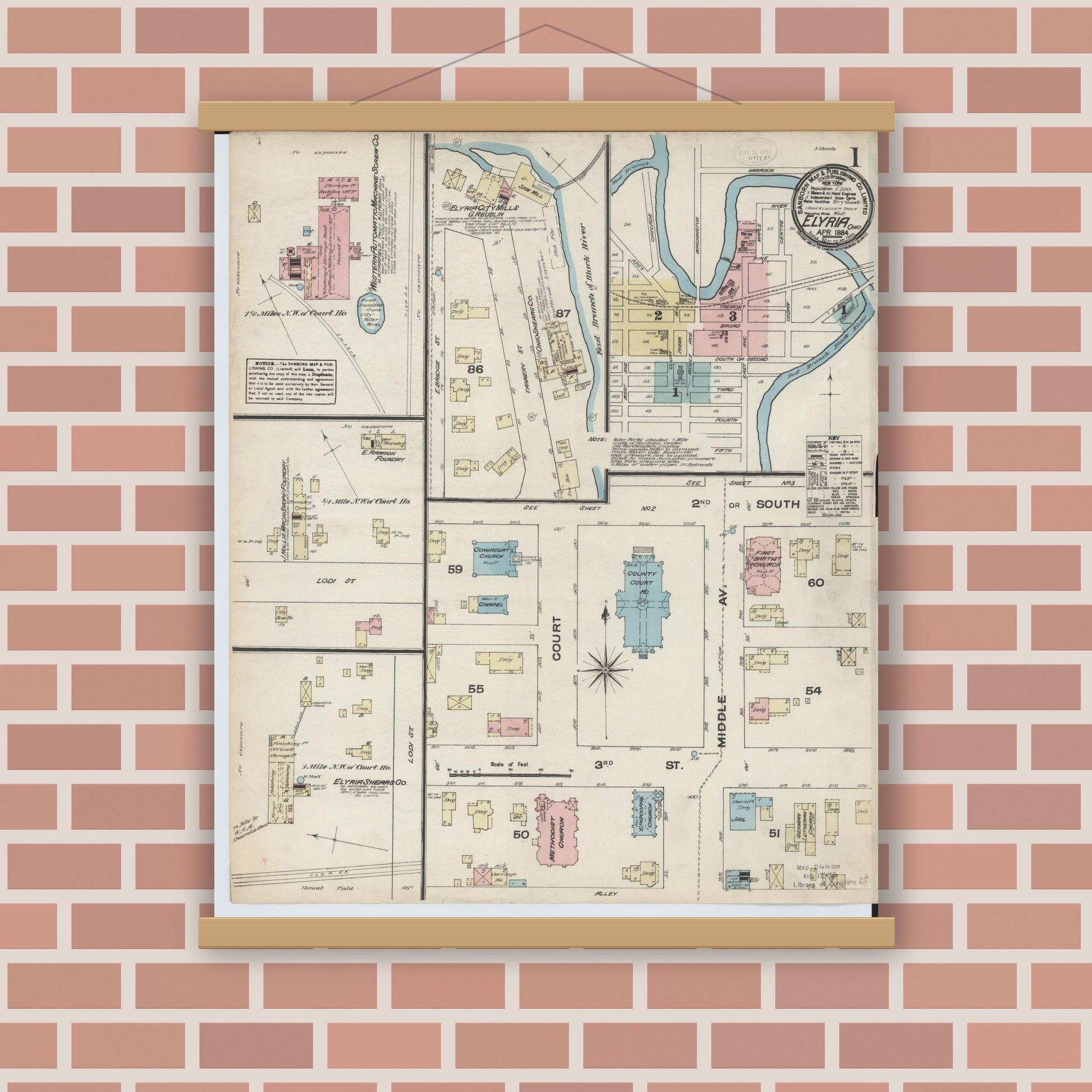 Old map wall art mockup — magnetic wood frame on brick wall — Sanborn Fire Insurance Map from Elyria, Lorain County, Ohio (1884), Sheet #0001