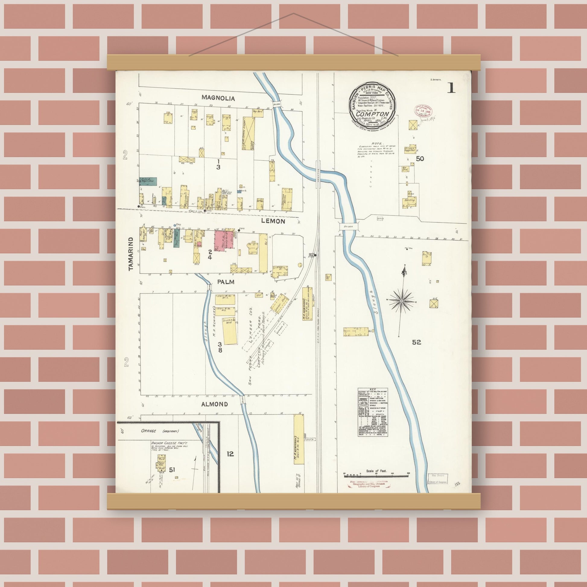 Old map wall art mockup — magnetic wood frame on brick wall — Sanborn Fire Insurance Map from Compton, Los Angeles County, California (1895), Sheet #0001