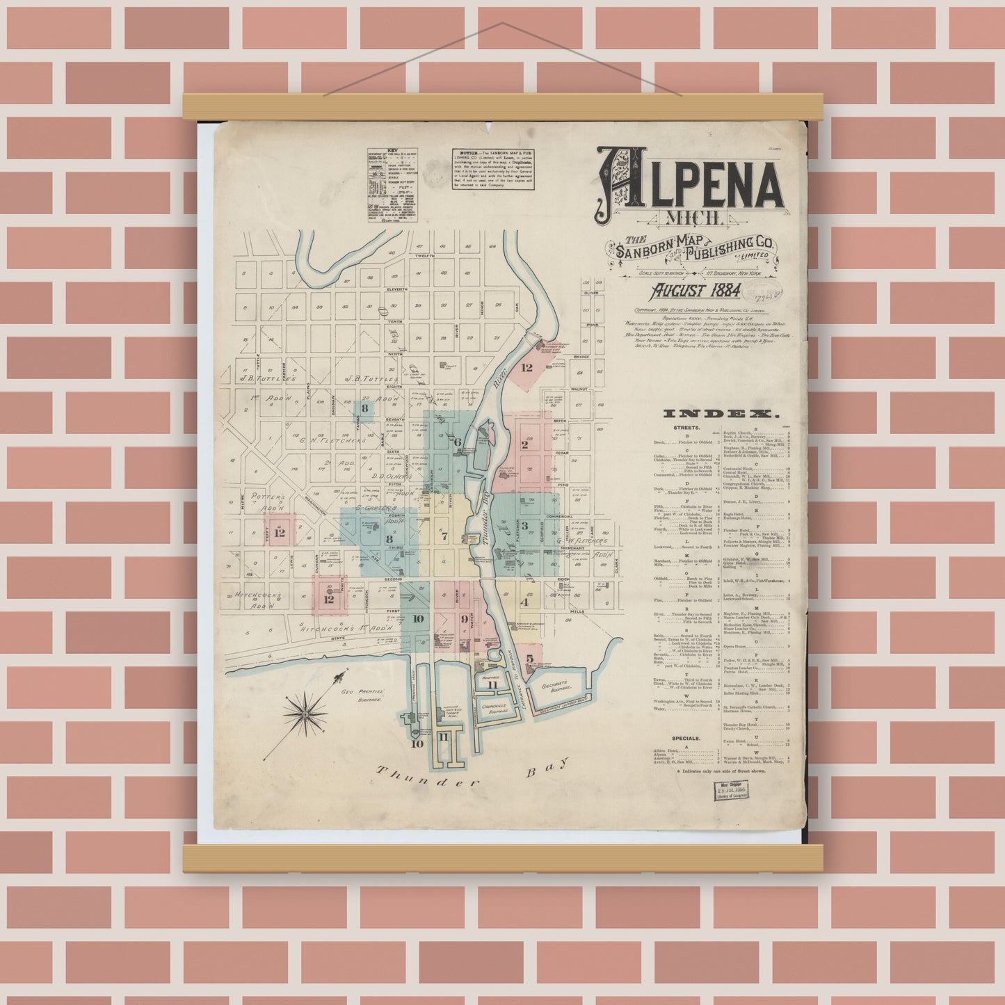 Old map wall art mockup — magnetic wood frame on brick wall — Sanborn Fire Insurance Map from Alpena, Alpena County, Michigan (1884) - Complete Map Set