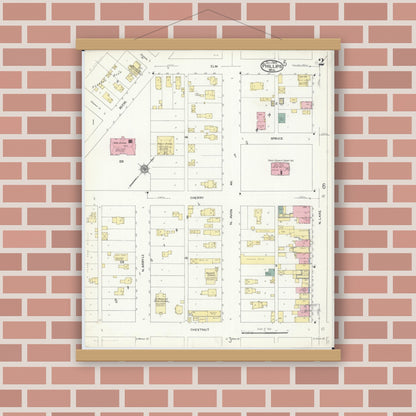 Old map wall art mockup — magnetic wood frame on brick wall — Sanborn Fire Insurance Map from Phillips, Price County, Wisconsin (1909), Sheet #0002