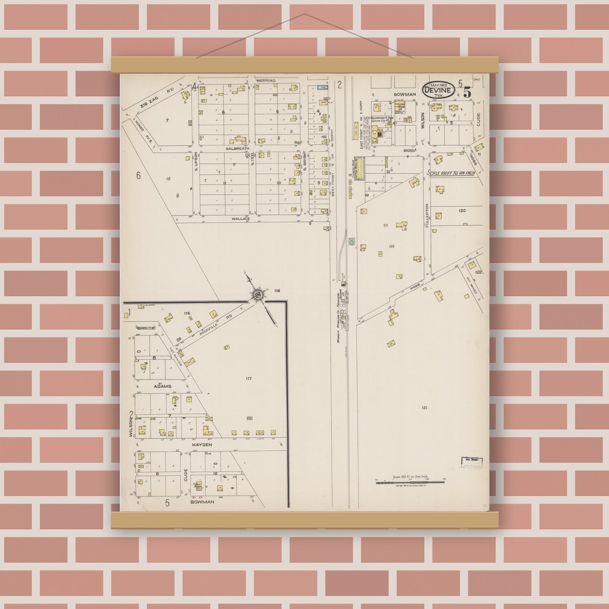 Old map wall art mockup — magnetic wood frame on brick wall — Sanborn Fire Insurance Map from Devine, Medina County, Texas (1922), Sheet #0005
