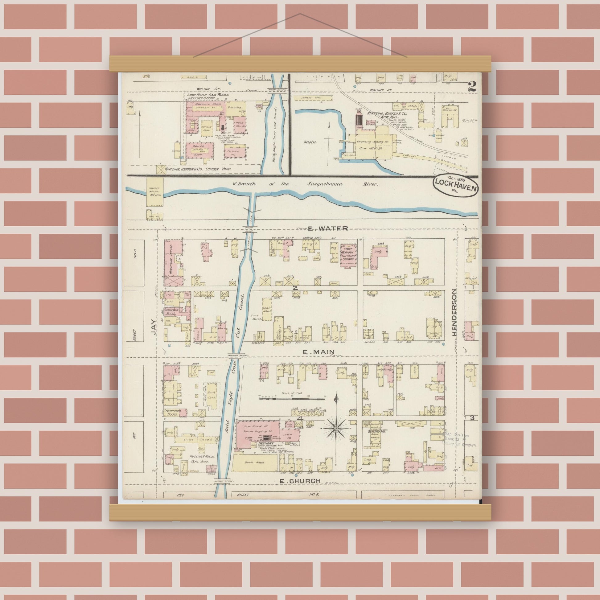 Old map wall art mockup — magnetic wood frame on brick wall — Sanborn Fire Insurance Map from Lock Haven, Clinton County, Pennsylvania (1885), Sheet #0002