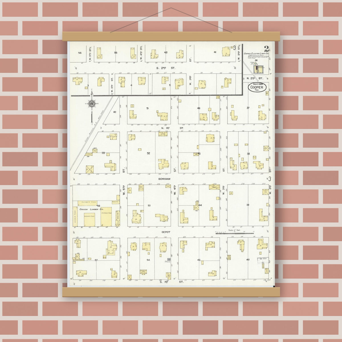 Old map wall art mockup — magnetic wood frame on brick wall — Sanborn Fire Insurance Map from Cooper, Delta County, Texas (1909), Sheet #0002