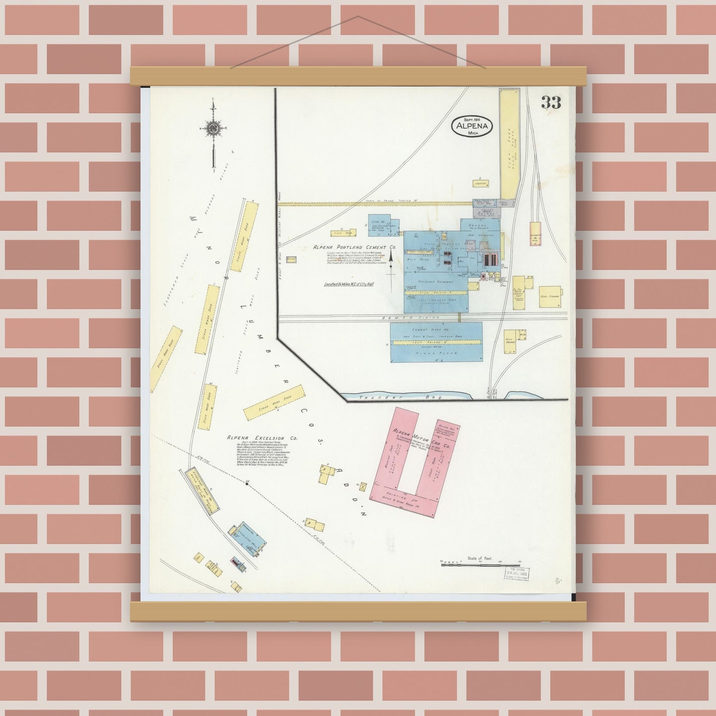 Old map wall art mockup — magnetic wood frame on brick wall — Sanborn Fire Insurance Map from Alpena, Alpena County, Michigan (1910), Sheet #0033