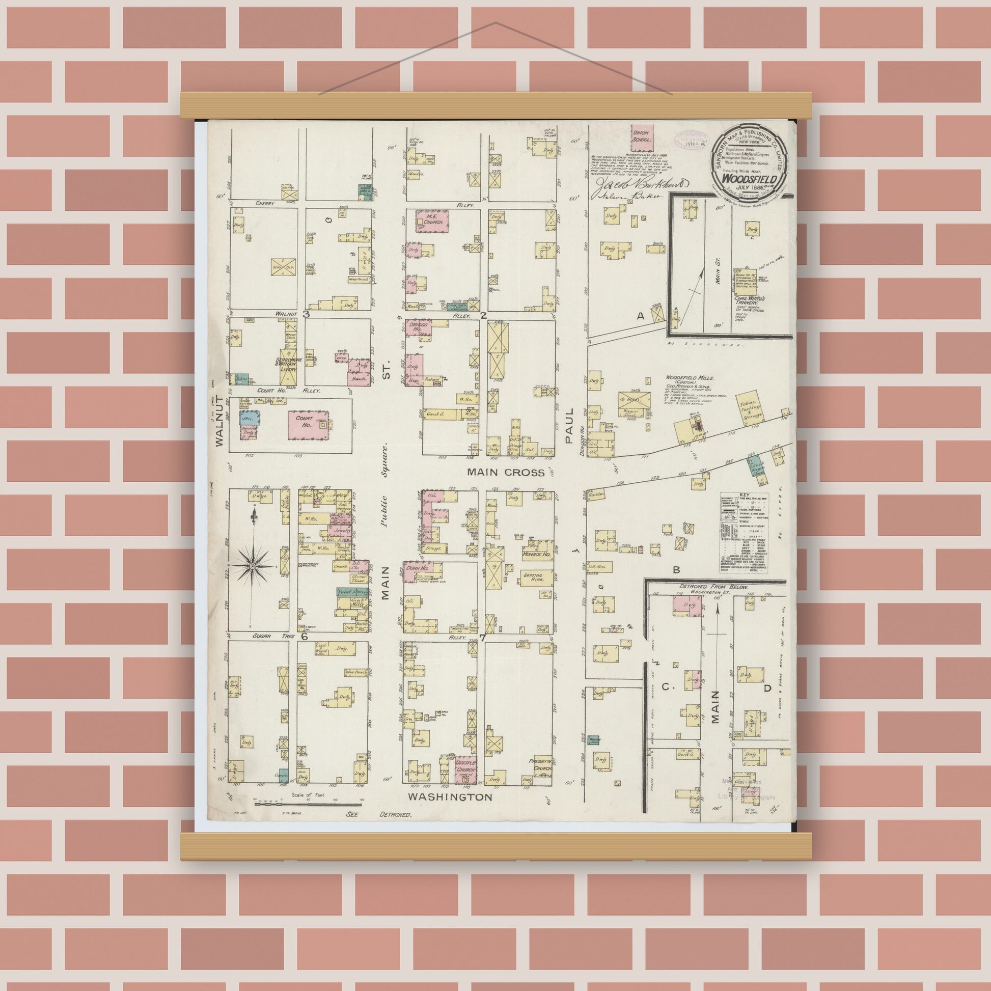 Old map wall art mockup — magnetic wood frame on brick wall — Sanborn Fire Insurance Map from Woodsfield, Monroe County, Ohio (1886), Sheet #0001