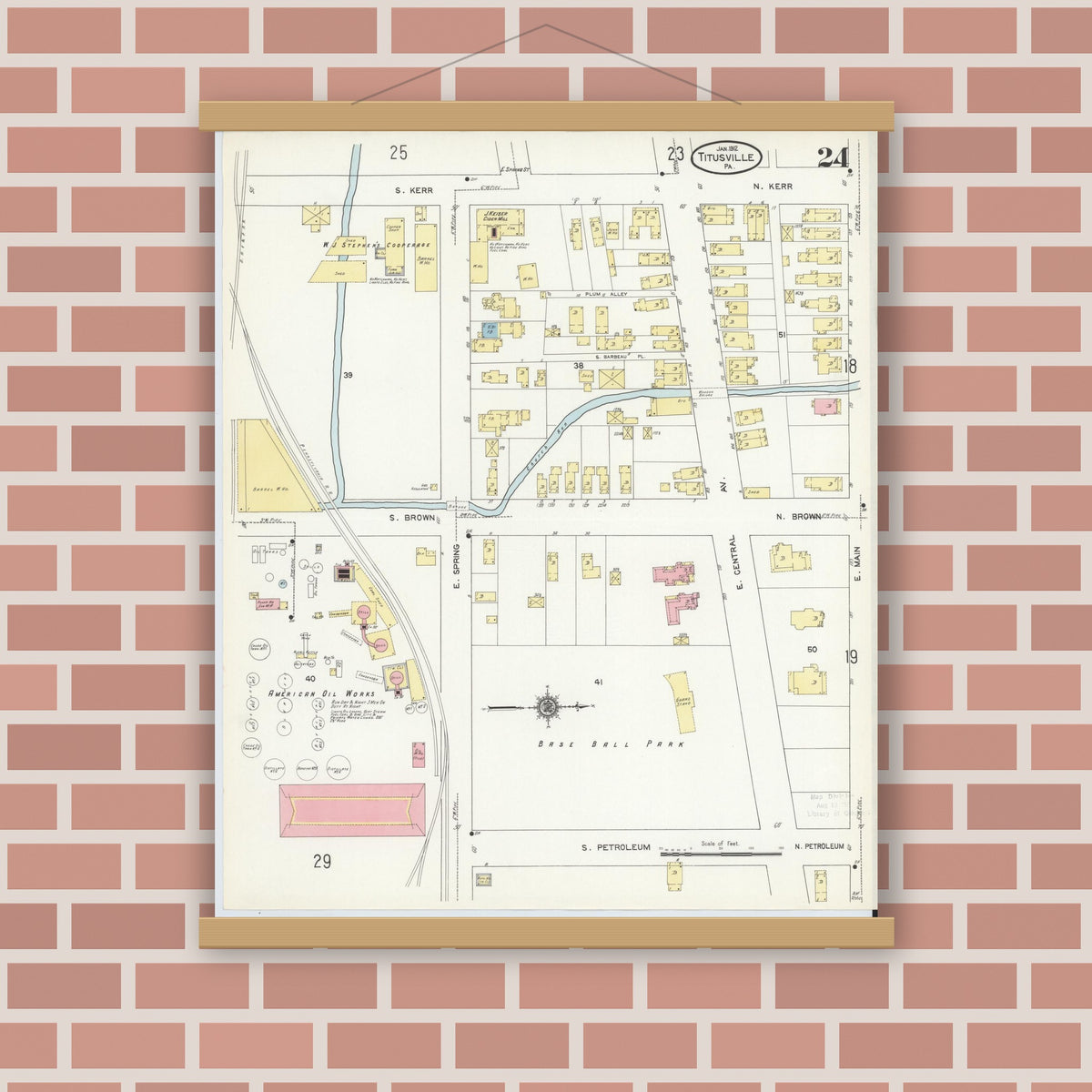 Old map wall art mockup — magnetic wood frame on brick wall — Sanborn Fire Insurance Map from Titusville, Crawford County, Pennsylvania (1912), Sheet #0024