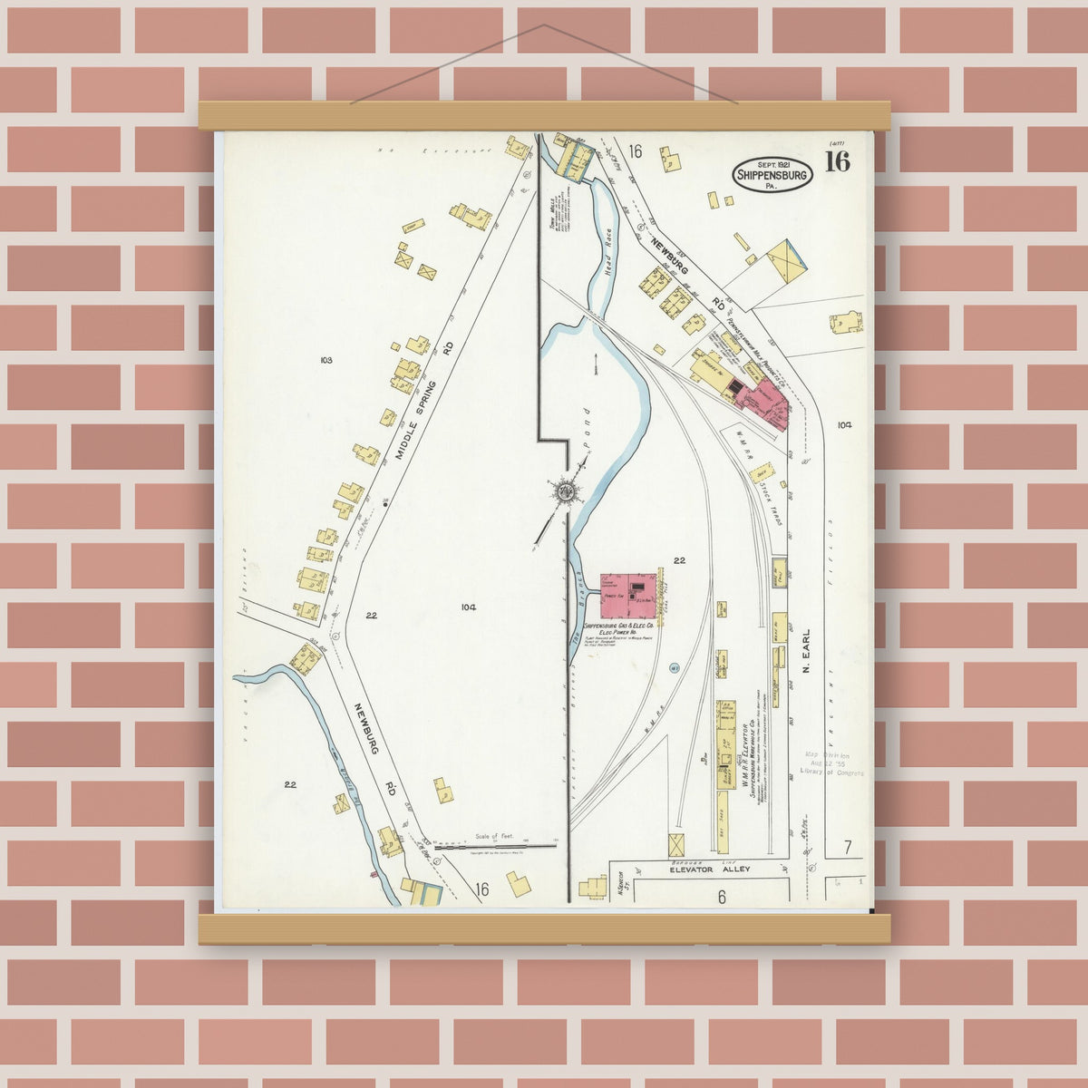 Old map wall art mockup — magnetic wood frame on brick wall — Sanborn Fire Insurance Map from Shippensburg, Cumberland And Franklin Counties, Pennsylvania (1921), Sheet #0016