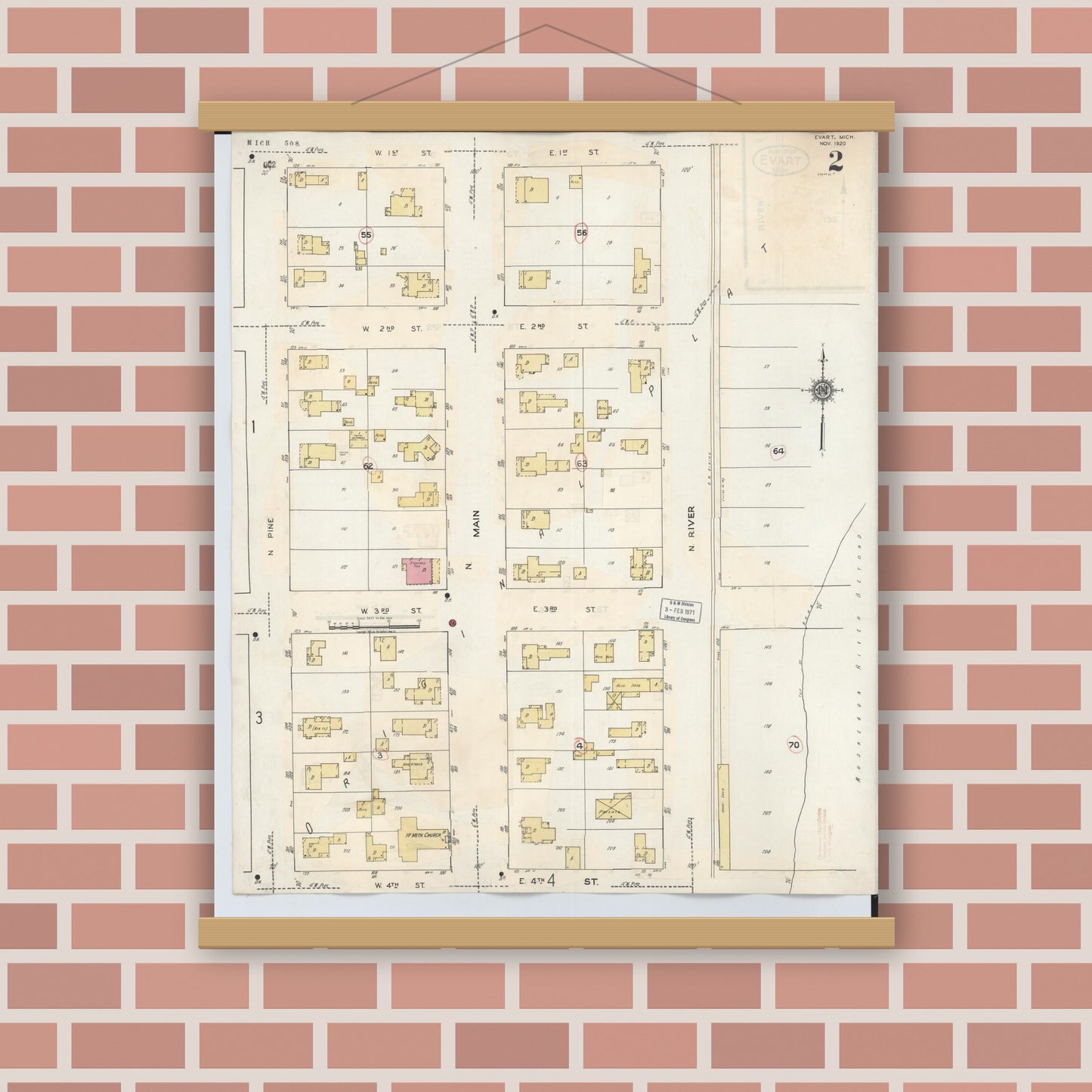 Old map wall art mockup — magnetic wood frame on brick wall — Sanborn Fire Insurance Map from Evart, Osceola County, Michigan (1942), Sheet #0002