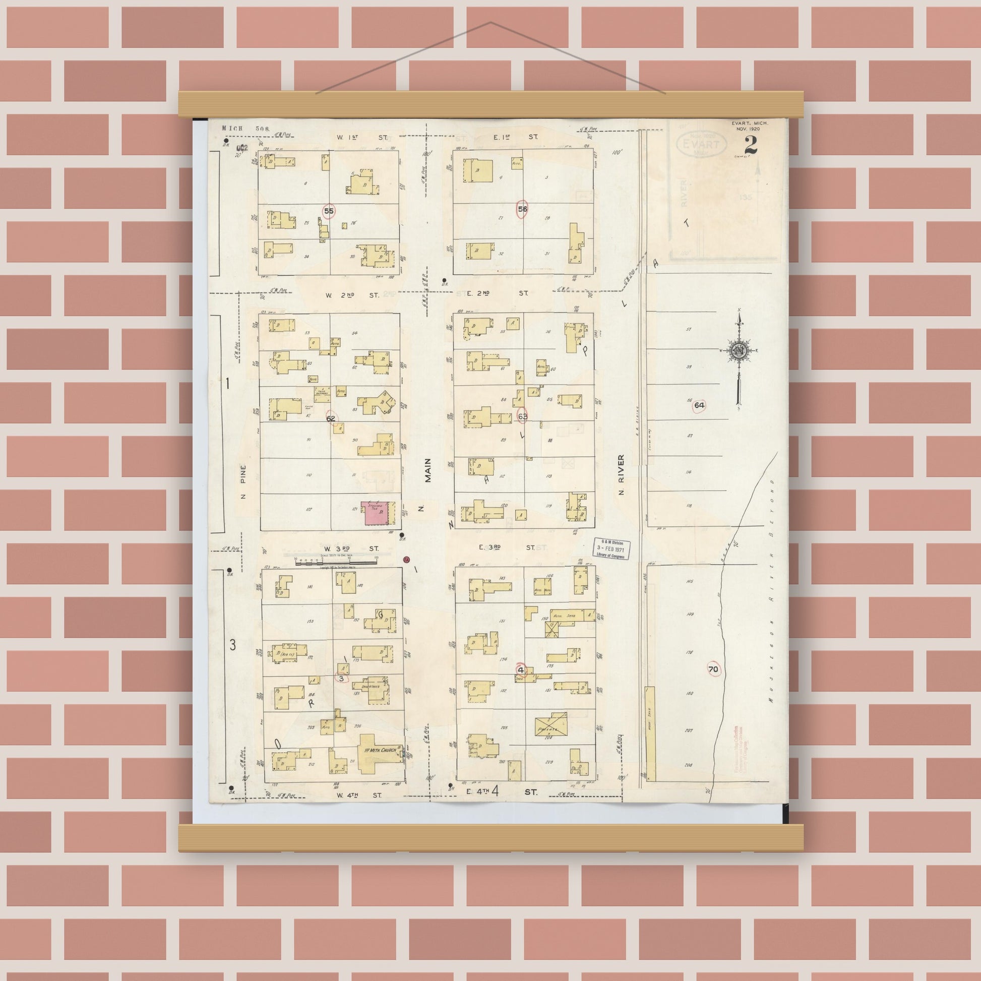 Old map wall art mockup — magnetic wood frame on brick wall — Sanborn Fire Insurance Map from Evart, Osceola County, Michigan (1942), Sheet #0002