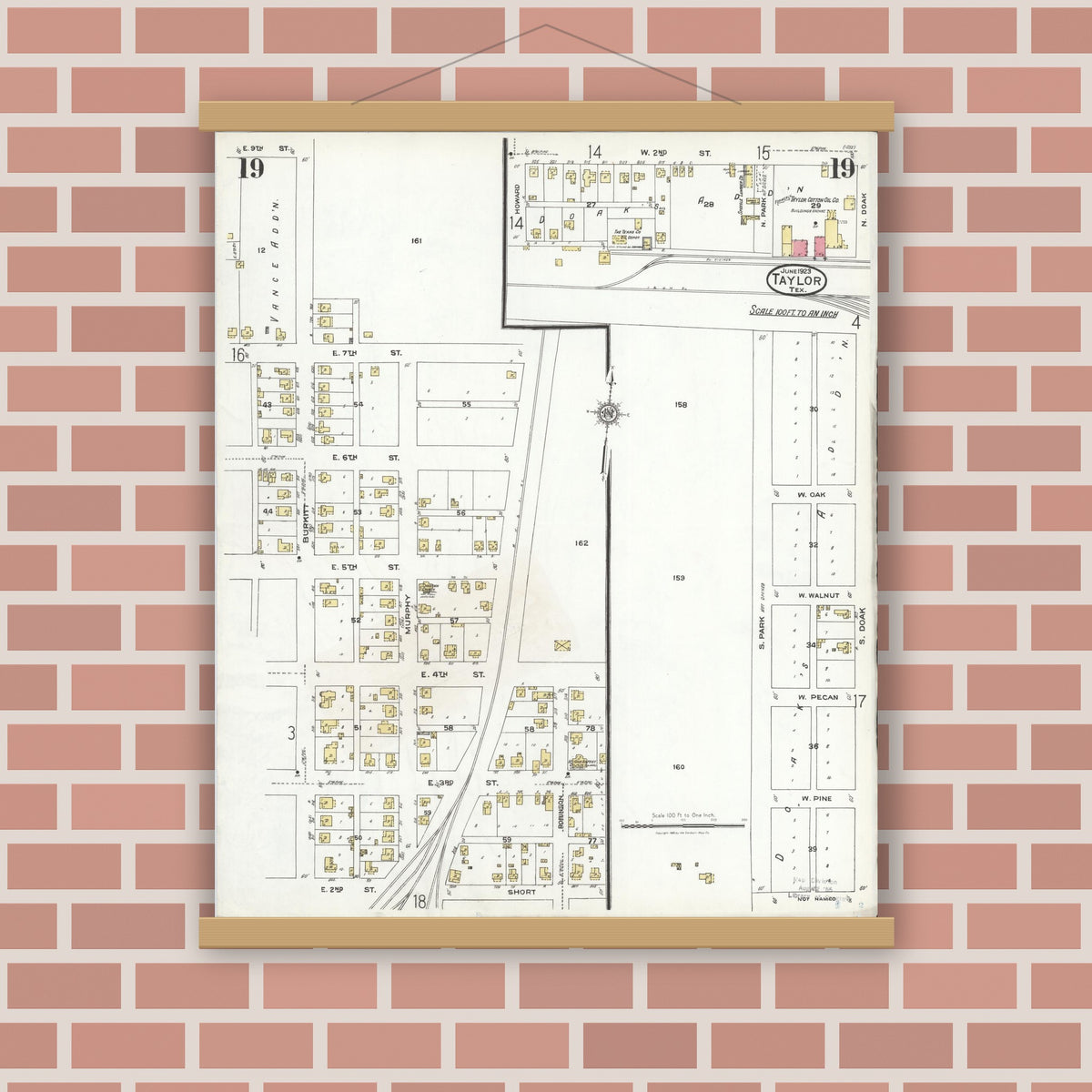 Old map wall art mockup — magnetic wood frame on brick wall — Sanborn Fire Insurance Map from Taylor, Williamson County, Texas (1923), Sheet #0019