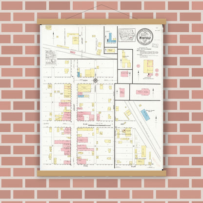 Old map wall art mockup — magnetic wood frame on brick wall — Sanborn Fire Insurance Map from Winfield, Henry County, Iowa (1917), Sheet #0001