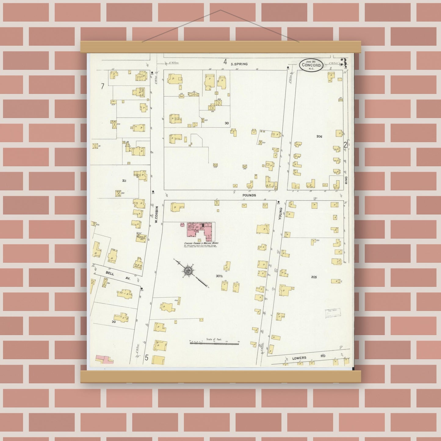 Old map wall art mockup — magnetic wood frame on brick wall — Sanborn Fire Insurance Map from Concord, Cabarrus County, North Carolina (1911), Sheet #0003