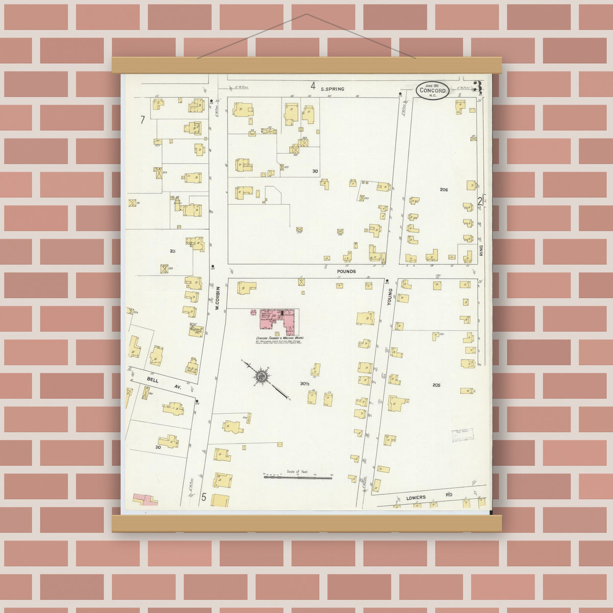 Old map wall art mockup — magnetic wood frame on brick wall — Sanborn Fire Insurance Map from Concord, Cabarrus County, North Carolina (1911), Sheet #0003
