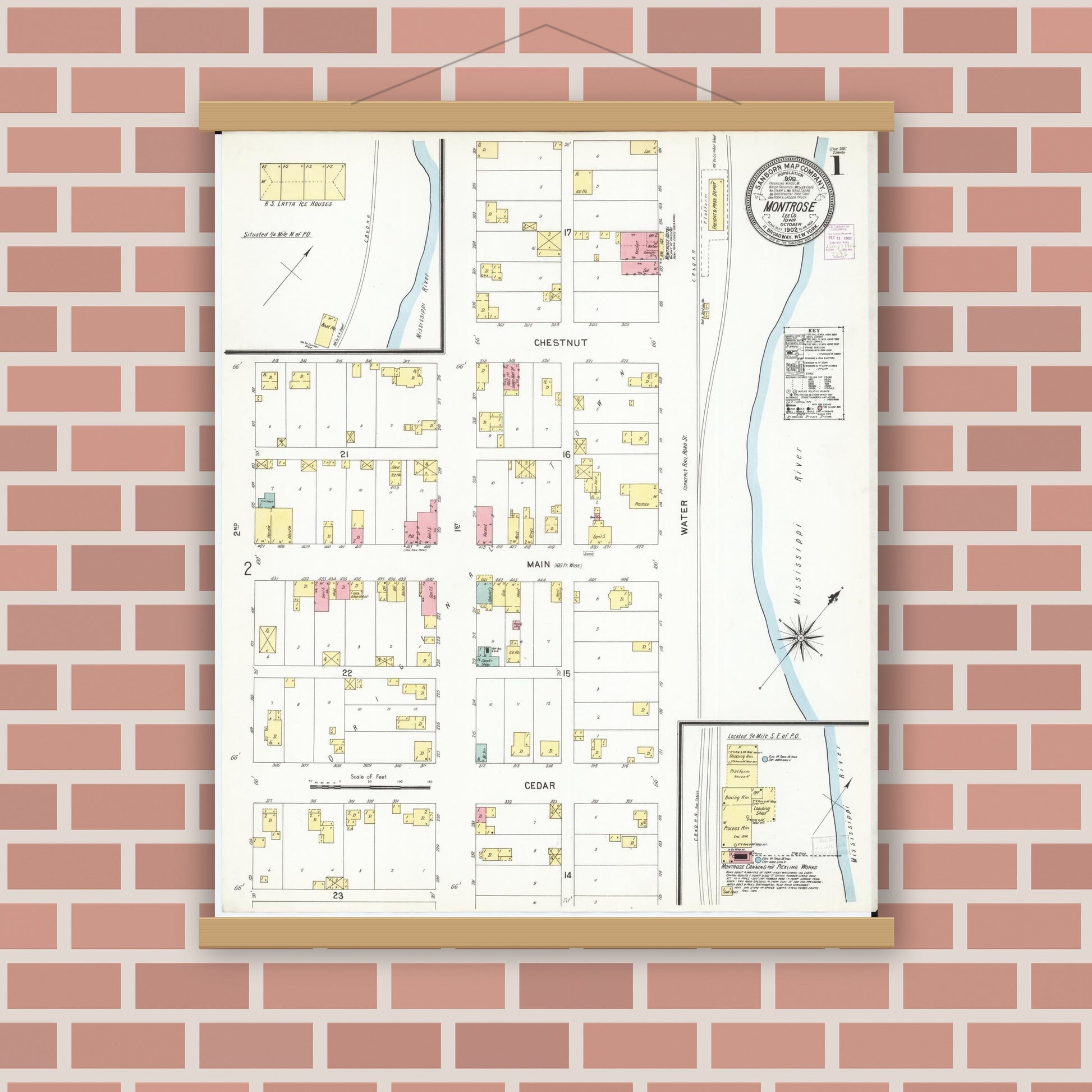 Old map wall art mockup — magnetic wood frame on brick wall — Sanborn Fire Insurance Map from Montrose, Lee County, Iowa (1902) â€” Complete Set