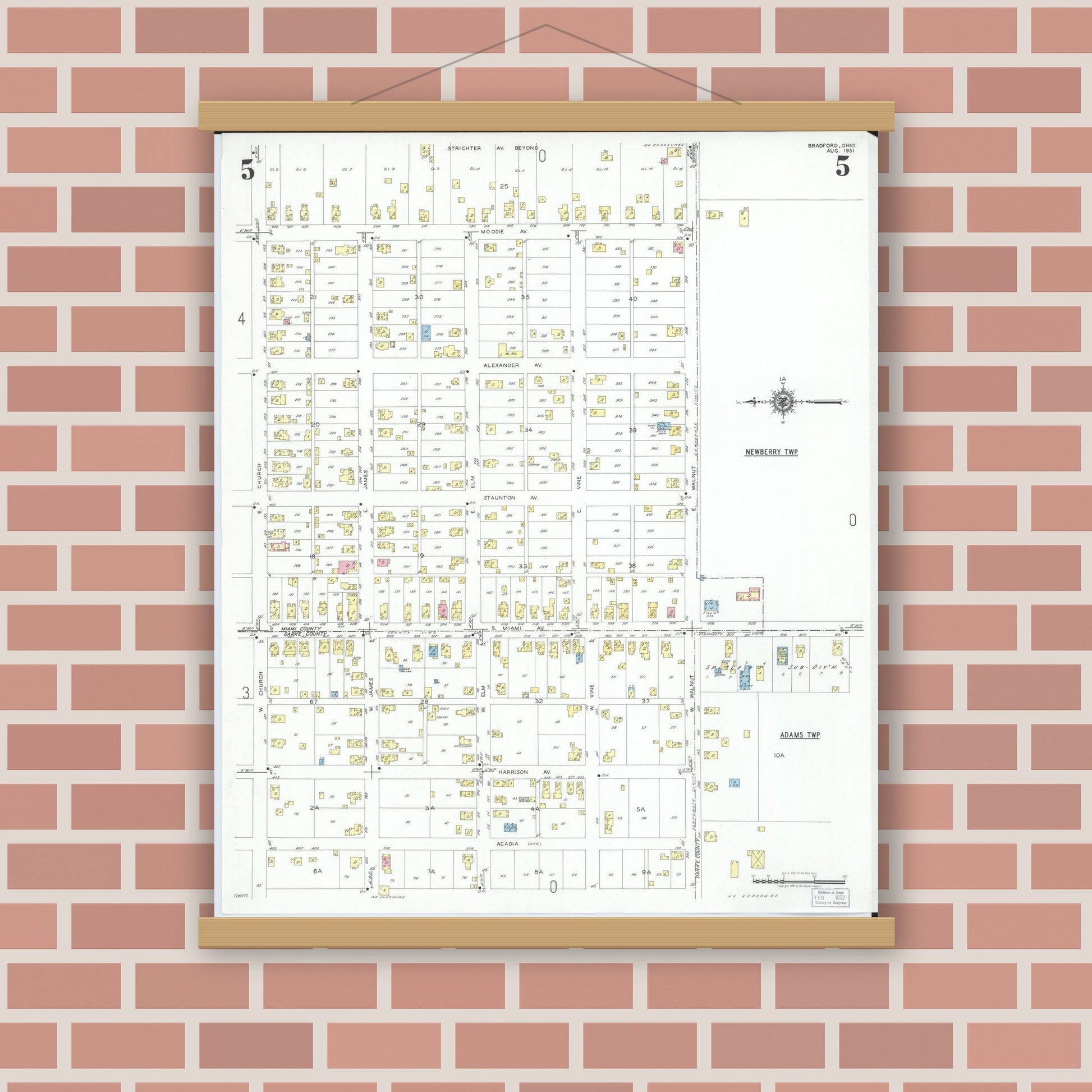 Old map wall art mockup — magnetic wood frame on brick wall — Sanborn Fire Insurance Map from Bradford, Darke and Miami Counties, Ohio (1951), Sheet #0005