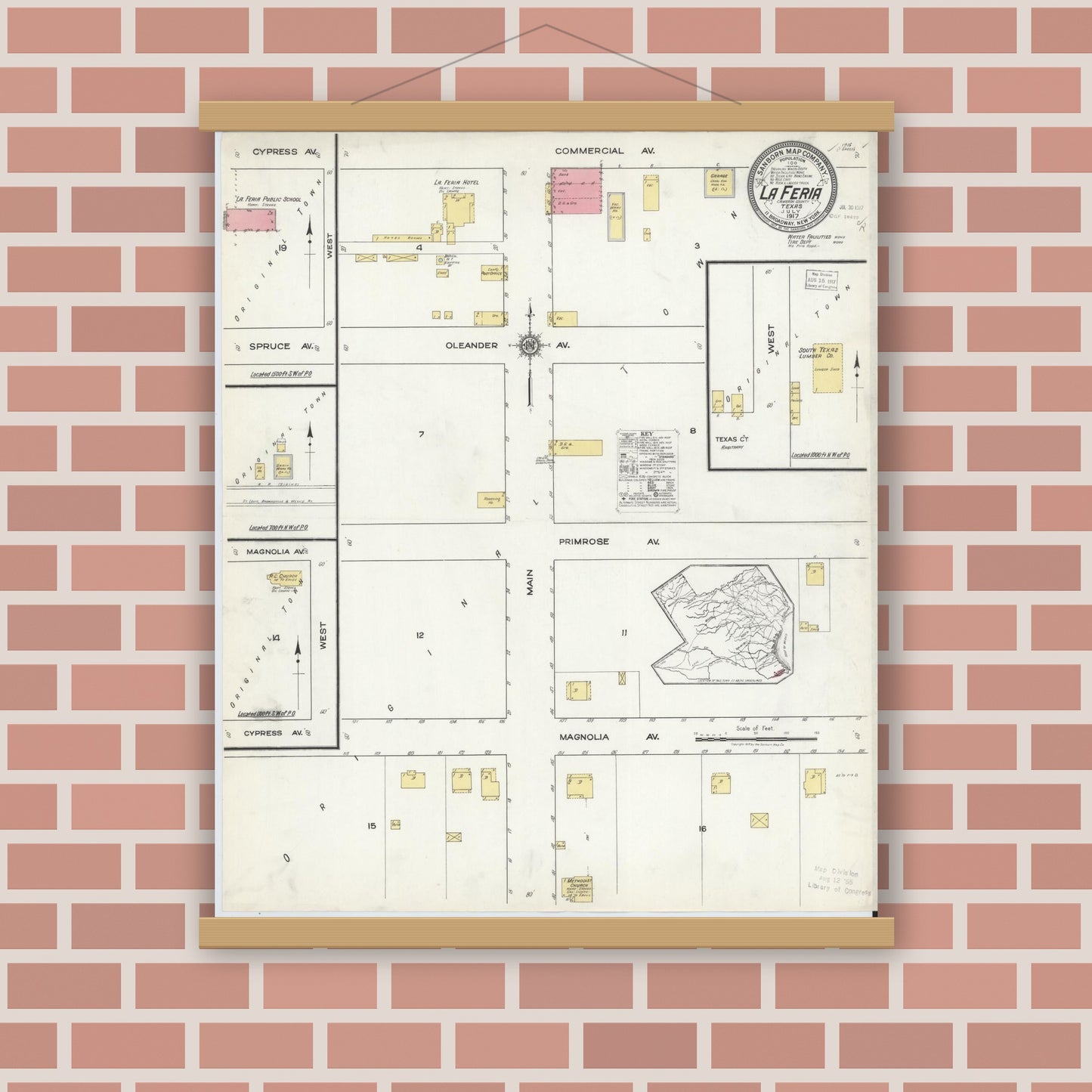 Old map wall art mockup — magnetic wood frame on brick wall — Sanborn Fire Insurance Map from La Feria, Cameron County, Texas (1917), Sheet #0001