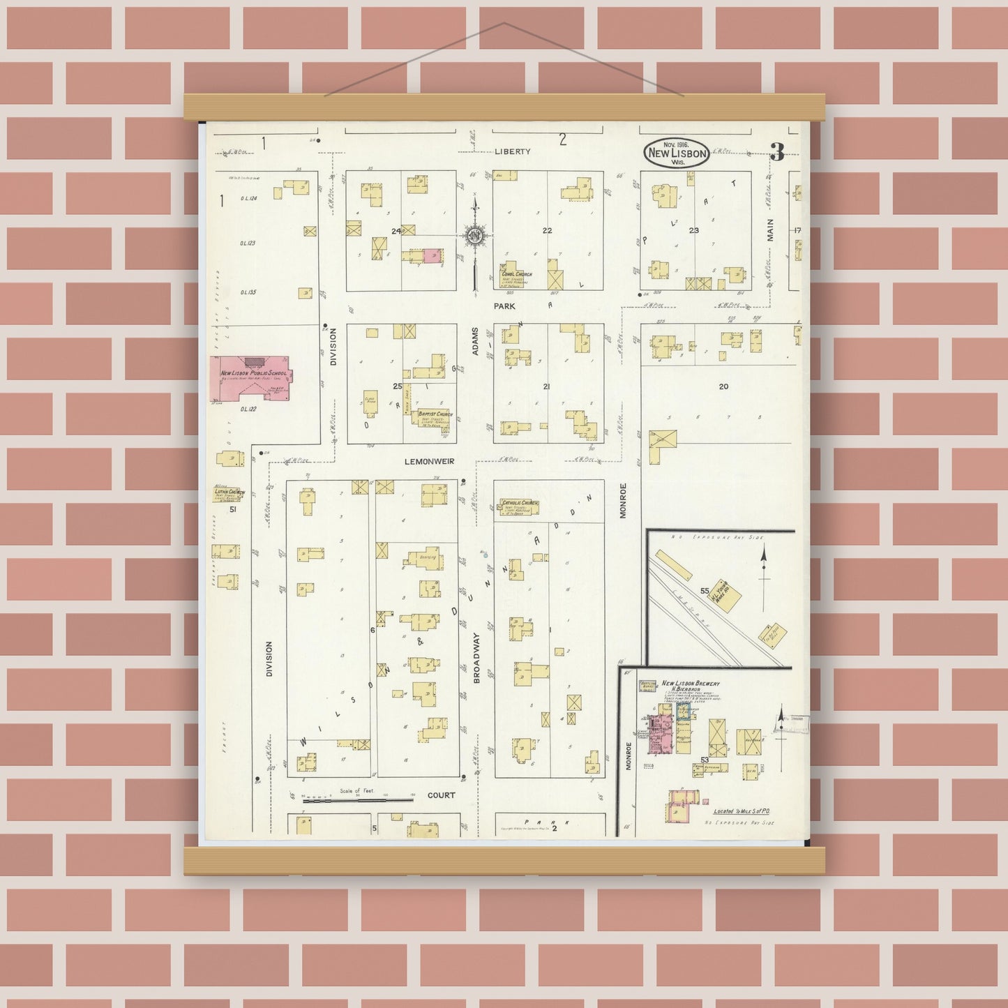 Old map wall art mockup — magnetic wood frame on brick wall — Sanborn Fire Insurance Map from New Lisbon, Juneau County, Wisconsin (1916), Sheet #0003
