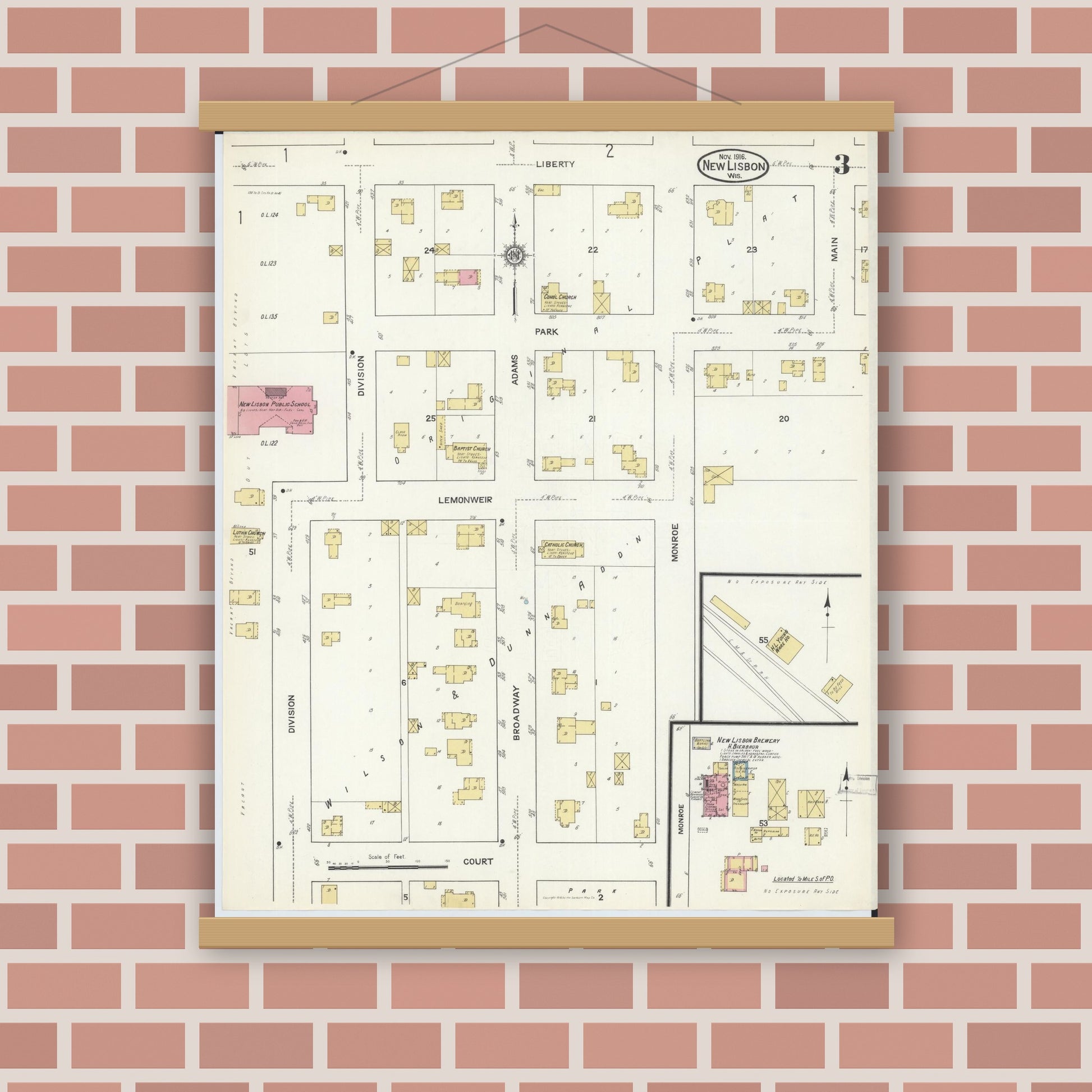 Old map wall art mockup — magnetic wood frame on brick wall — Sanborn Fire Insurance Map from New Lisbon, Juneau County, Wisconsin (1916), Sheet #0003