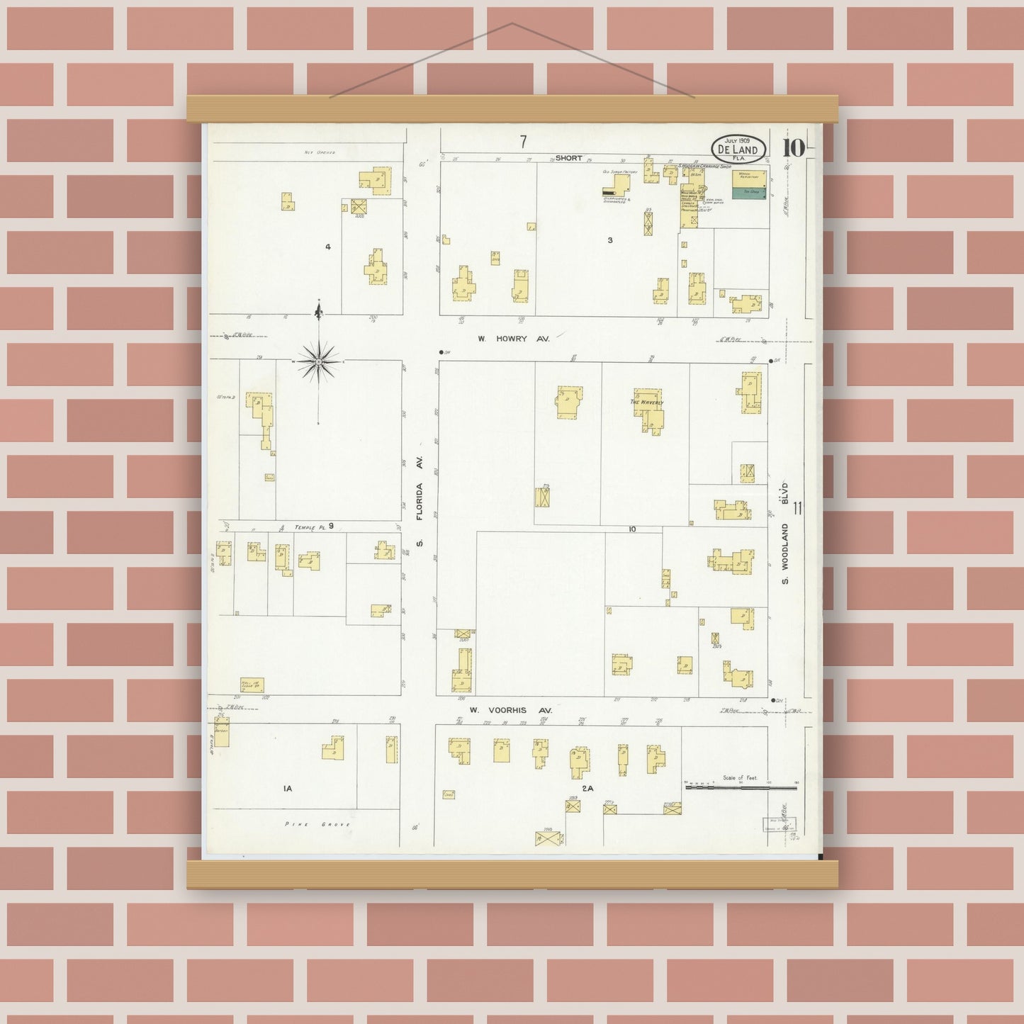 Old map wall art mockup — magnetic wood frame on brick wall — Sanborn Fire Insurance Map from De Land, Volusia County, Florida (1909), Sheet #0010