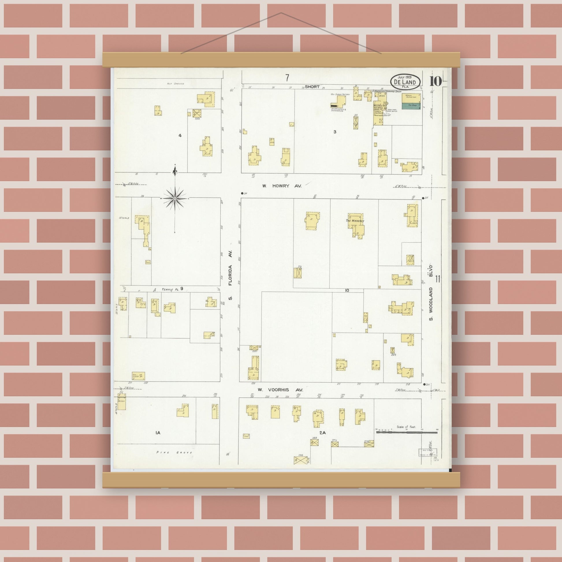 Old map wall art mockup — magnetic wood frame on brick wall — Sanborn Fire Insurance Map from De Land, Volusia County, Florida (1909), Sheet #0010