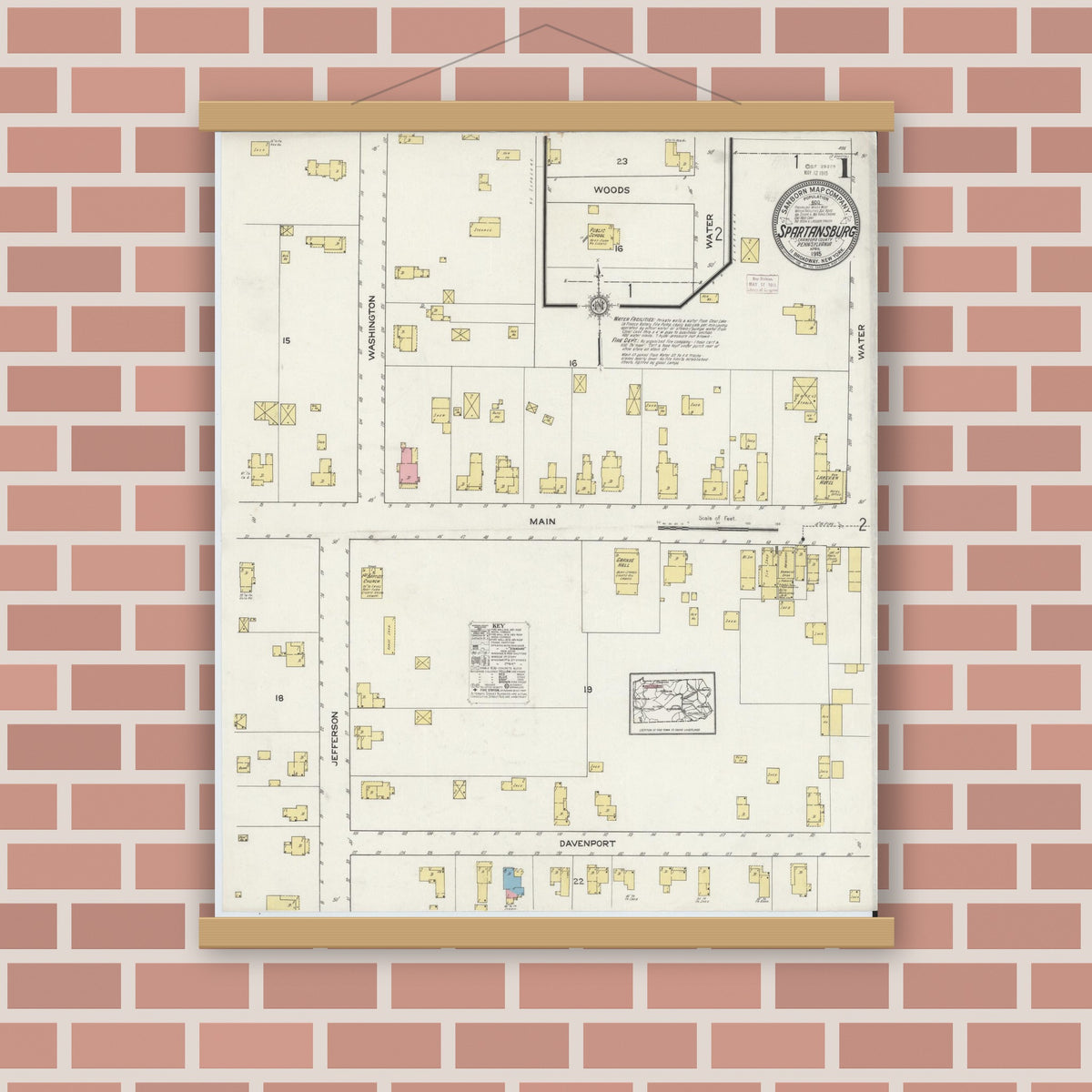 Old map wall art mockup — magnetic wood frame on brick wall — Sanborn Fire Insurance Map from Spartansburg, Crawford County, Pennsylvania (1915), Sheet #0001