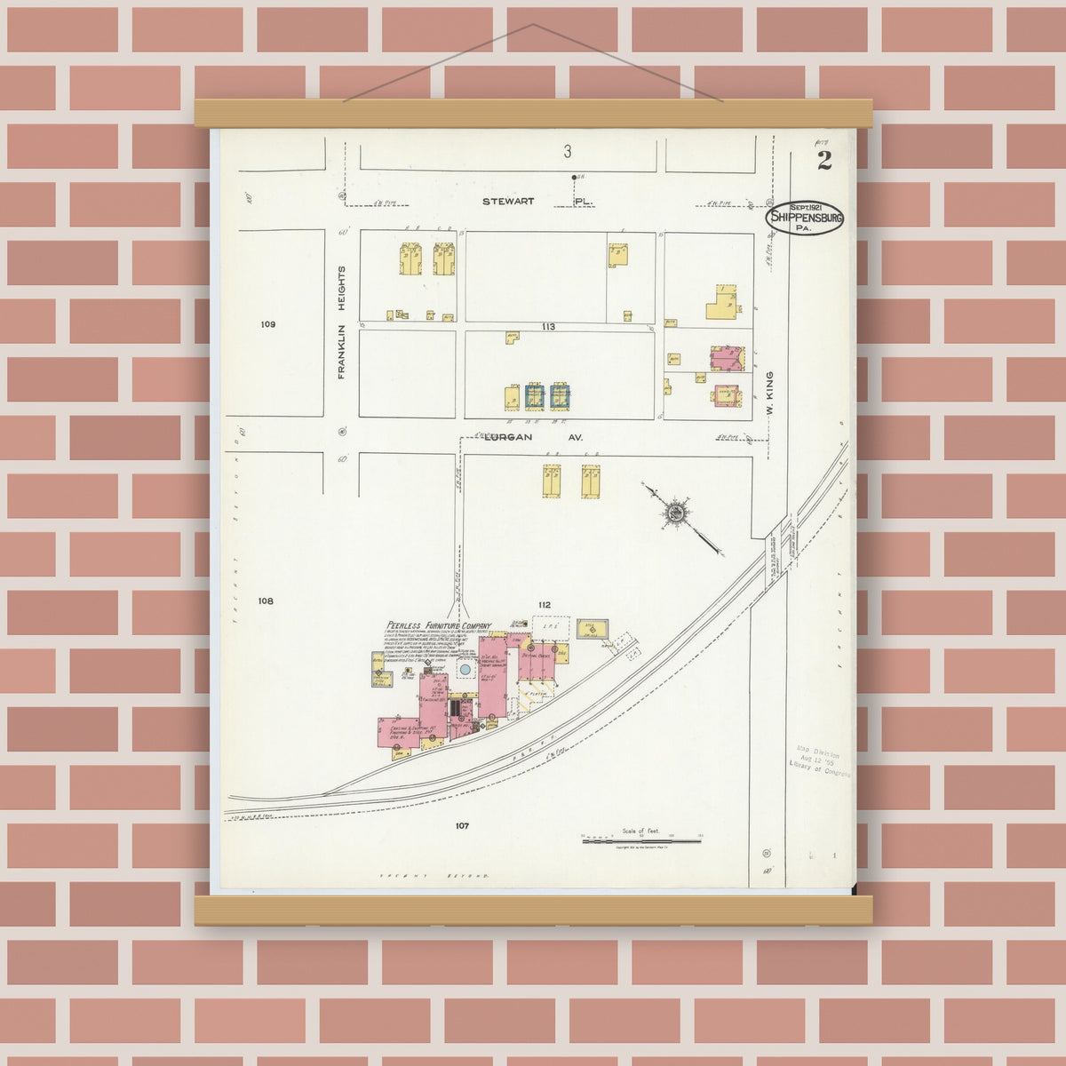 Old map wall art mockup — magnetic wood frame on brick wall — Sanborn Fire Insurance Map from Shippensburg, Cumberland And Franklin Counties, Pennsylvania (1921), Sheet #0002