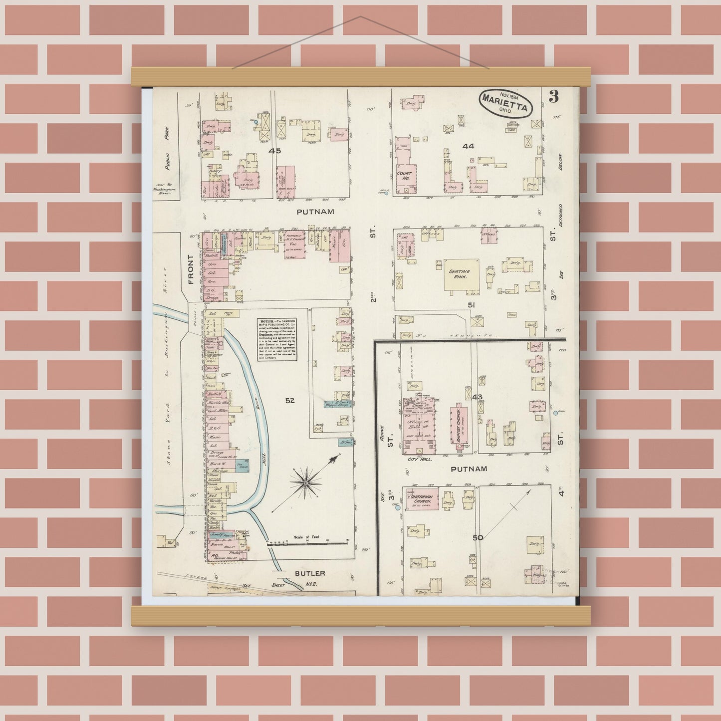 Old map wall art mockup — magnetic wood frame on brick wall — Sanborn Fire Insurance Map from Marietta, Washington County, Ohio (1884), Sheet #0003