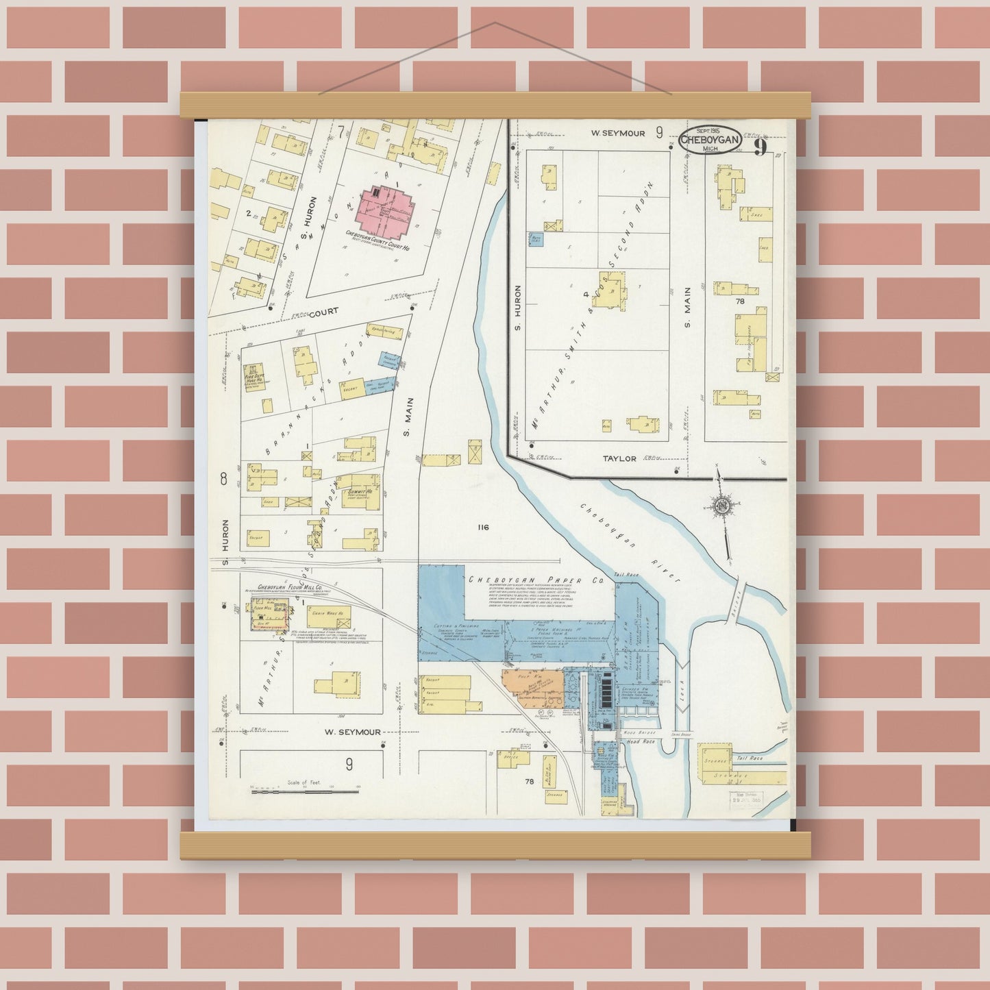 Old map wall art mockup — magnetic wood frame on brick wall — Sanborn Fire Insurance Map from Cheboygan, Cheboygan County, Michigan (1915), Sheet #0009
