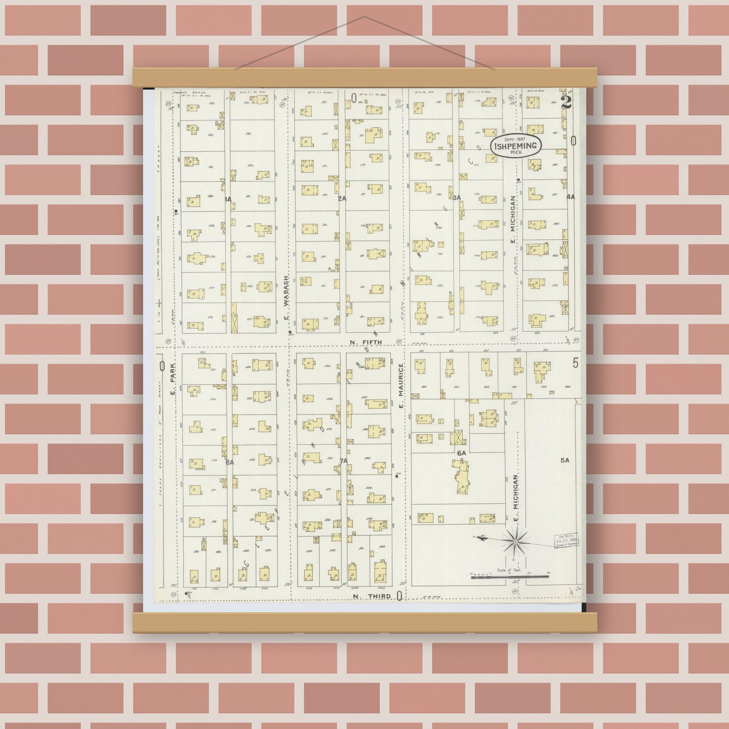 Old map wall art mockup — magnetic wood frame on brick wall — Sanborn Fire Insurance Map from Ishpeming, Marquette County, Michigan (1897), Sheet #0002