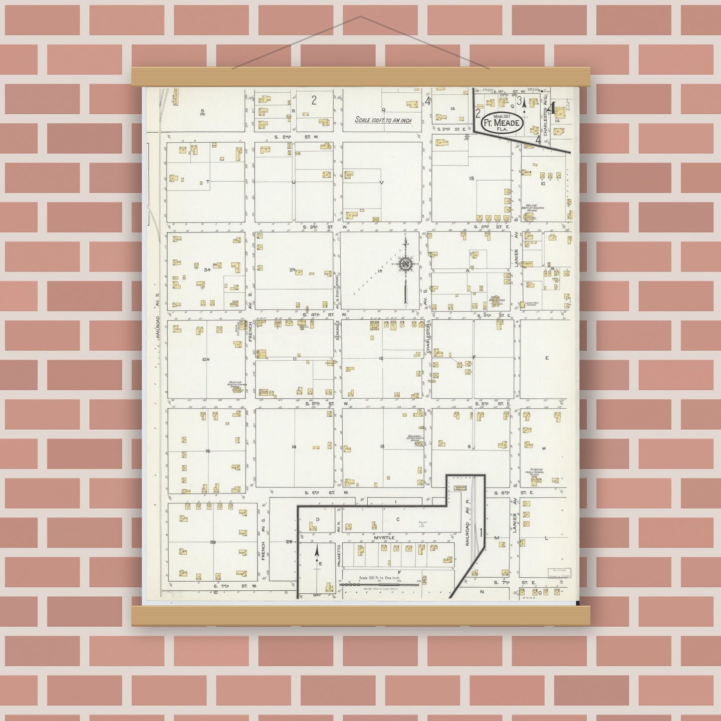 Old map wall art mockup — magnetic wood frame on brick wall — Sanborn Fire Insurance Map from Fort Meade, Polk County, Florida (1917), Sheet #0004