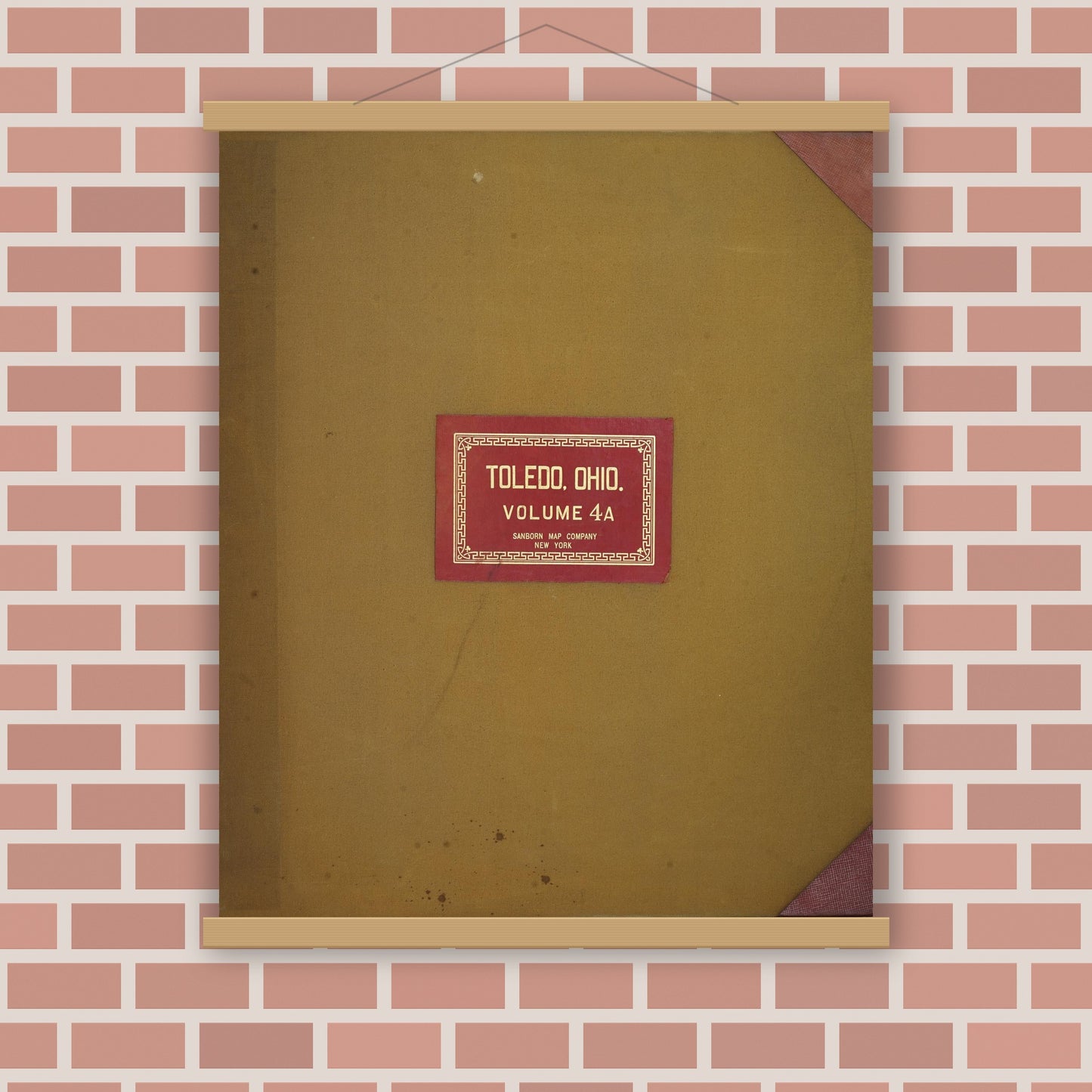 Old map wall art mockup — magnetic wood frame on brick wall — Sanborn Fire Insurance Map from Toledo, Lucas County, Ohio (1949), Sheet #0001