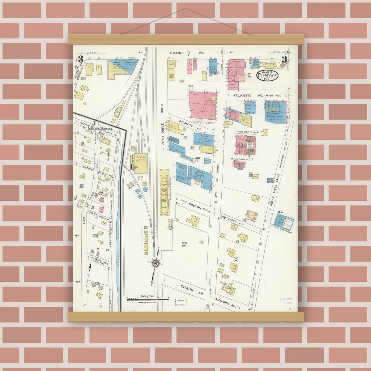 Old map wall art mockup — magnetic wood frame on brick wall — Sanborn Fire Insurance Map from Fort Pierce, St Lucie County, Florida (1924), Sheet #0003