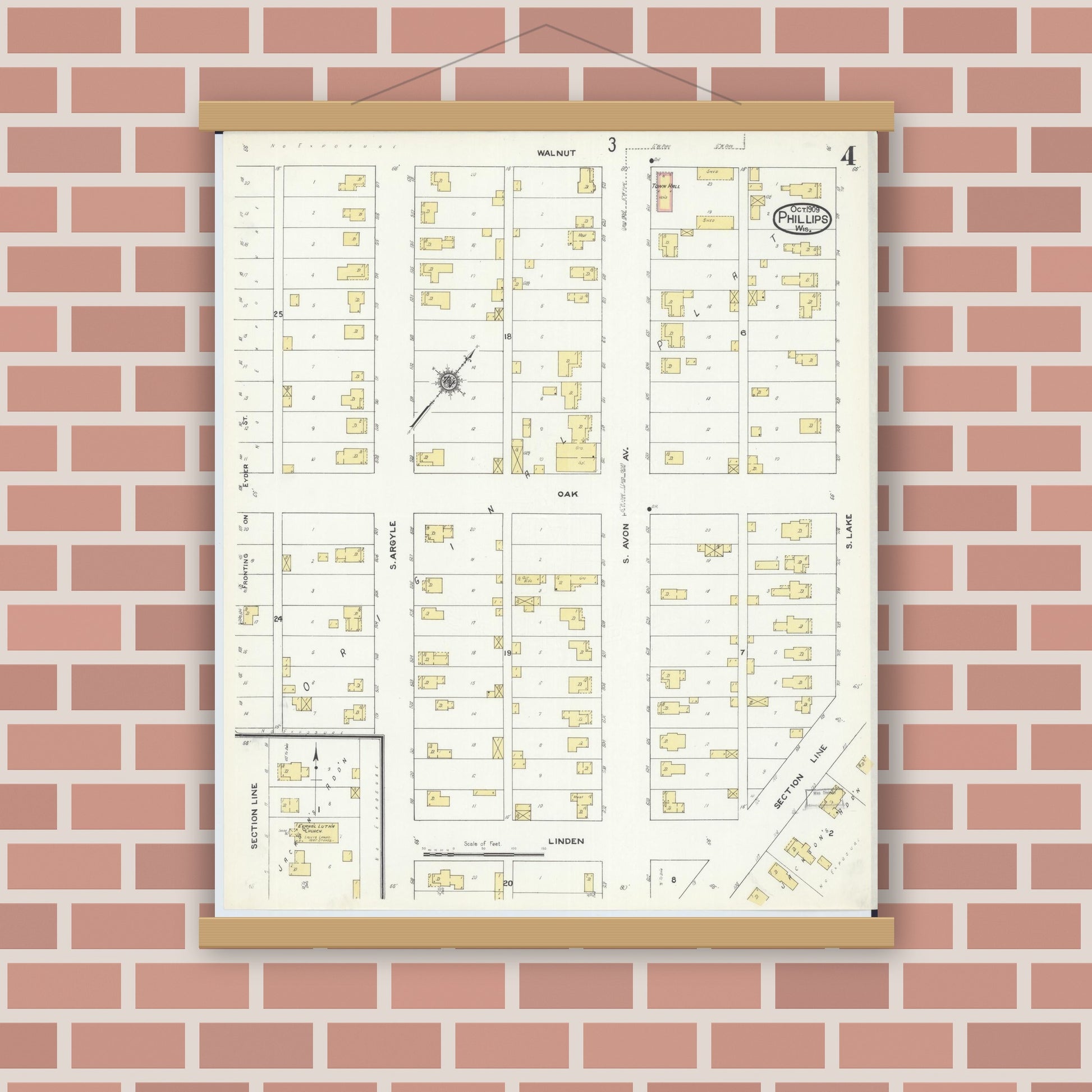 Old map wall art mockup — magnetic wood frame on brick wall — Sanborn Fire Insurance Map from Phillips, Price County, Wisconsin (1909), Sheet #0004