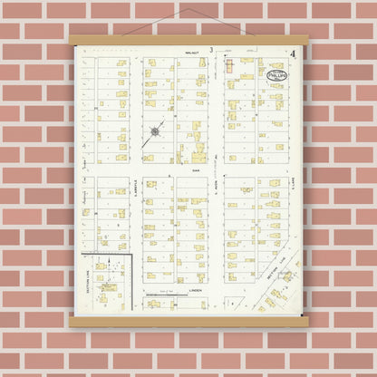 Old map wall art mockup — magnetic wood frame on brick wall — Sanborn Fire Insurance Map from Phillips, Price County, Wisconsin (1909), Sheet #0004