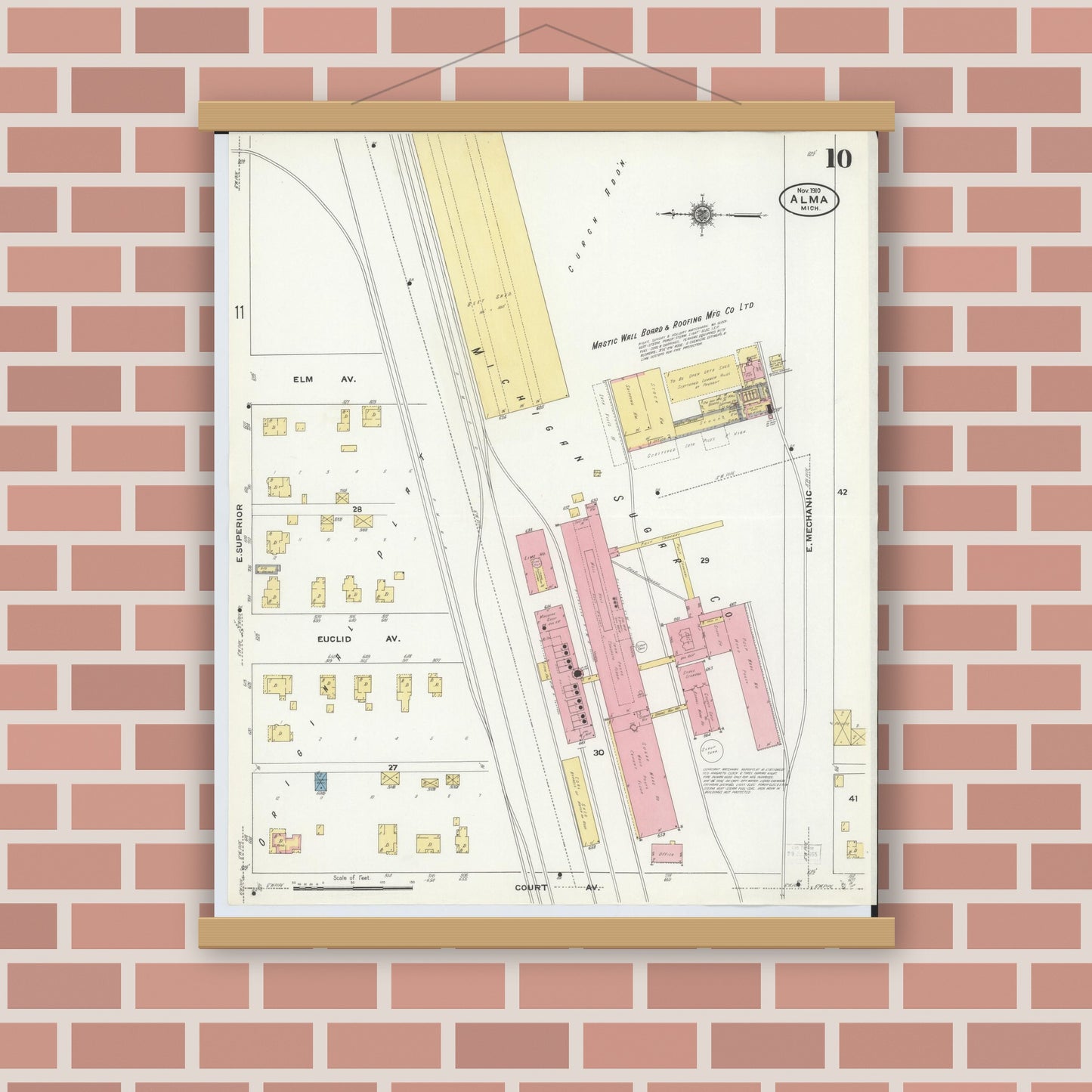 Old map wall art mockup — magnetic wood frame on brick wall — Sanborn Fire Insurance Map from Alma, Gratiot County, Michigan (1910), Sheet #0010