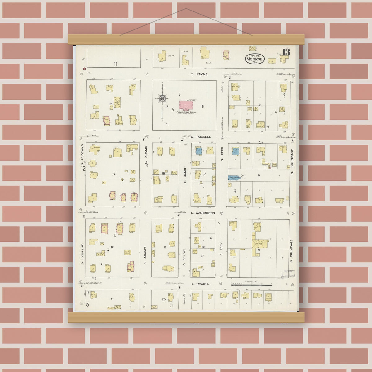 Old map wall art mockup — magnetic wood frame on brick wall — Sanborn Fire Insurance Map from Monroe, Green County, Wisconsin (1915), Sheet #0013