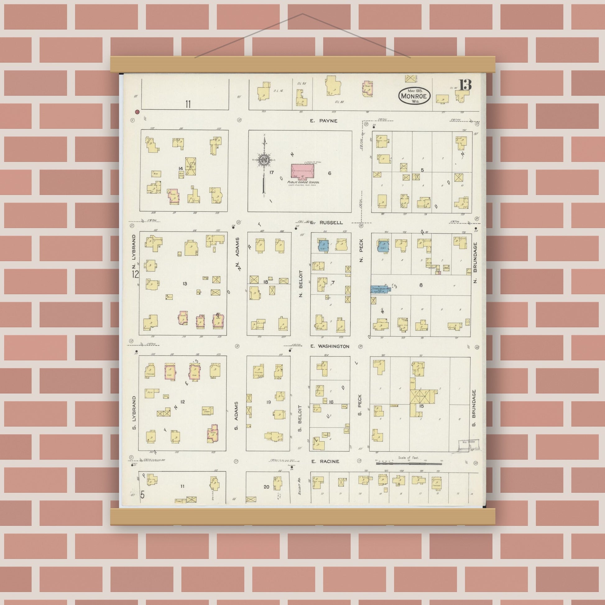 Old map wall art mockup — magnetic wood frame on brick wall — Sanborn Fire Insurance Map from Monroe, Green County, Wisconsin (1915), Sheet #0013