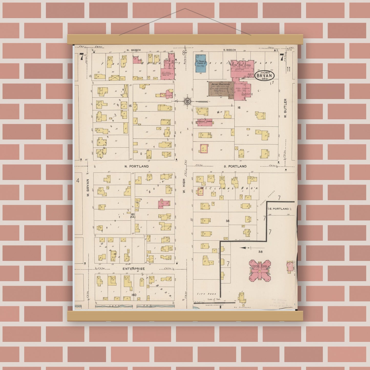 Old map wall art mockup — magnetic wood frame on brick wall — Sanborn Fire Insurance Map from Bryan, Williams County, Ohio (1923), Sheet #0007