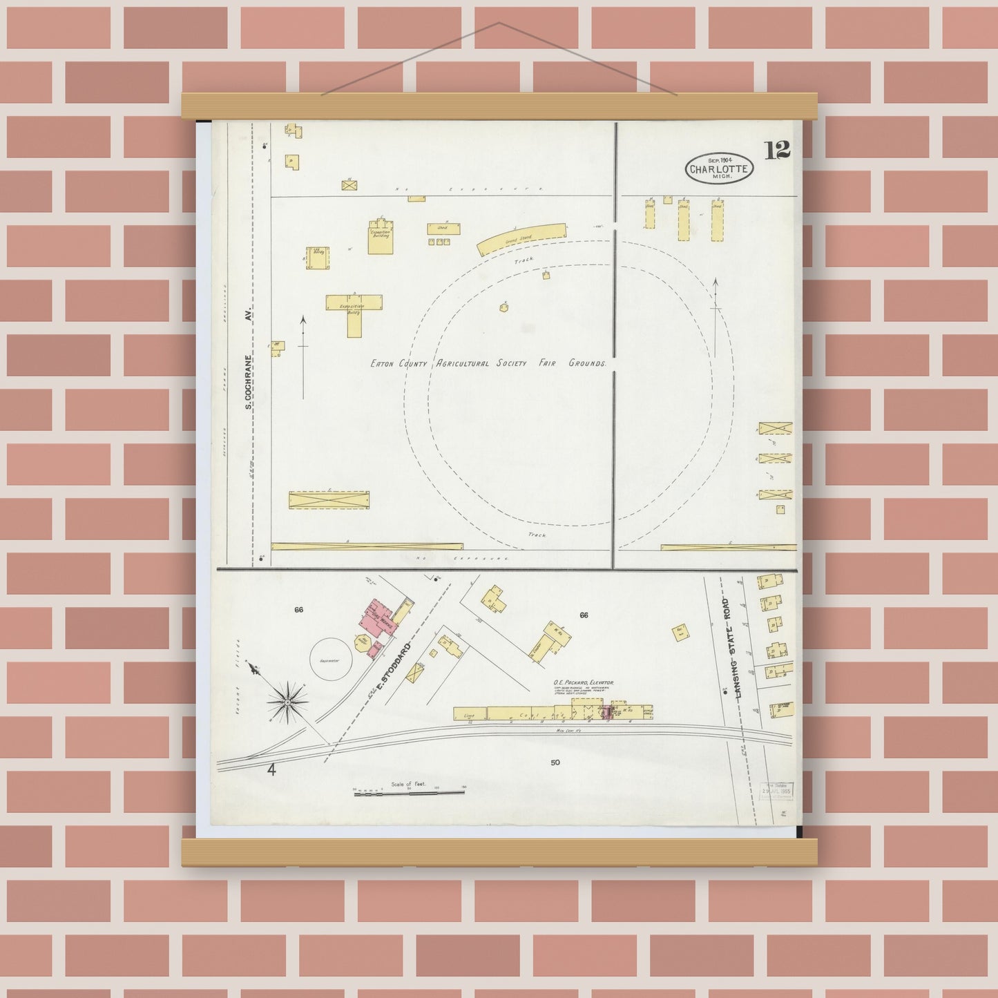 Old map wall art mockup — magnetic wood frame on brick wall — Sanborn Fire Insurance Map from Charlotte, Eaton County, Michigan (1904), Sheet #0012