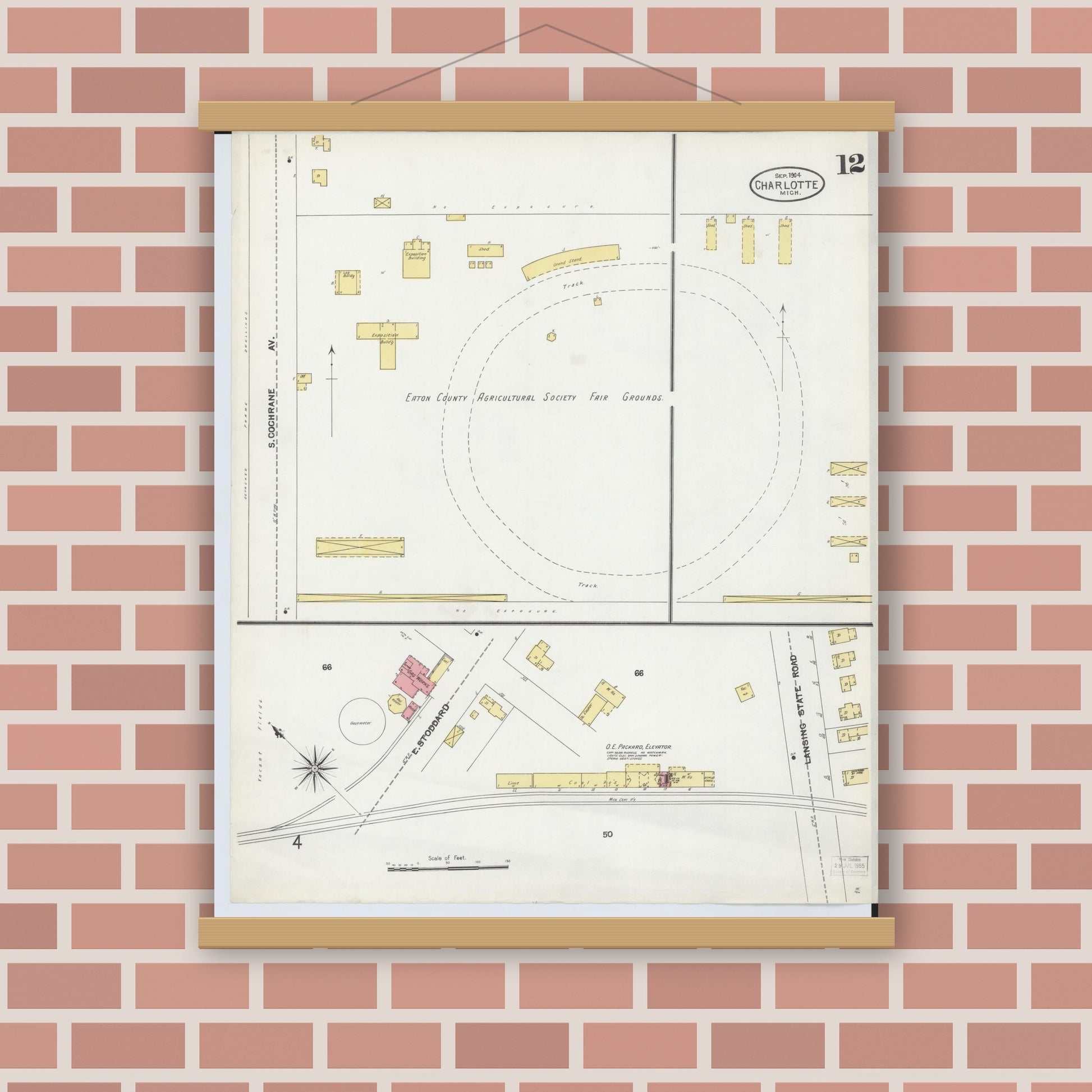 Old map wall art mockup — magnetic wood frame on brick wall — Sanborn Fire Insurance Map from Charlotte, Eaton County, Michigan (1904), Sheet #0012