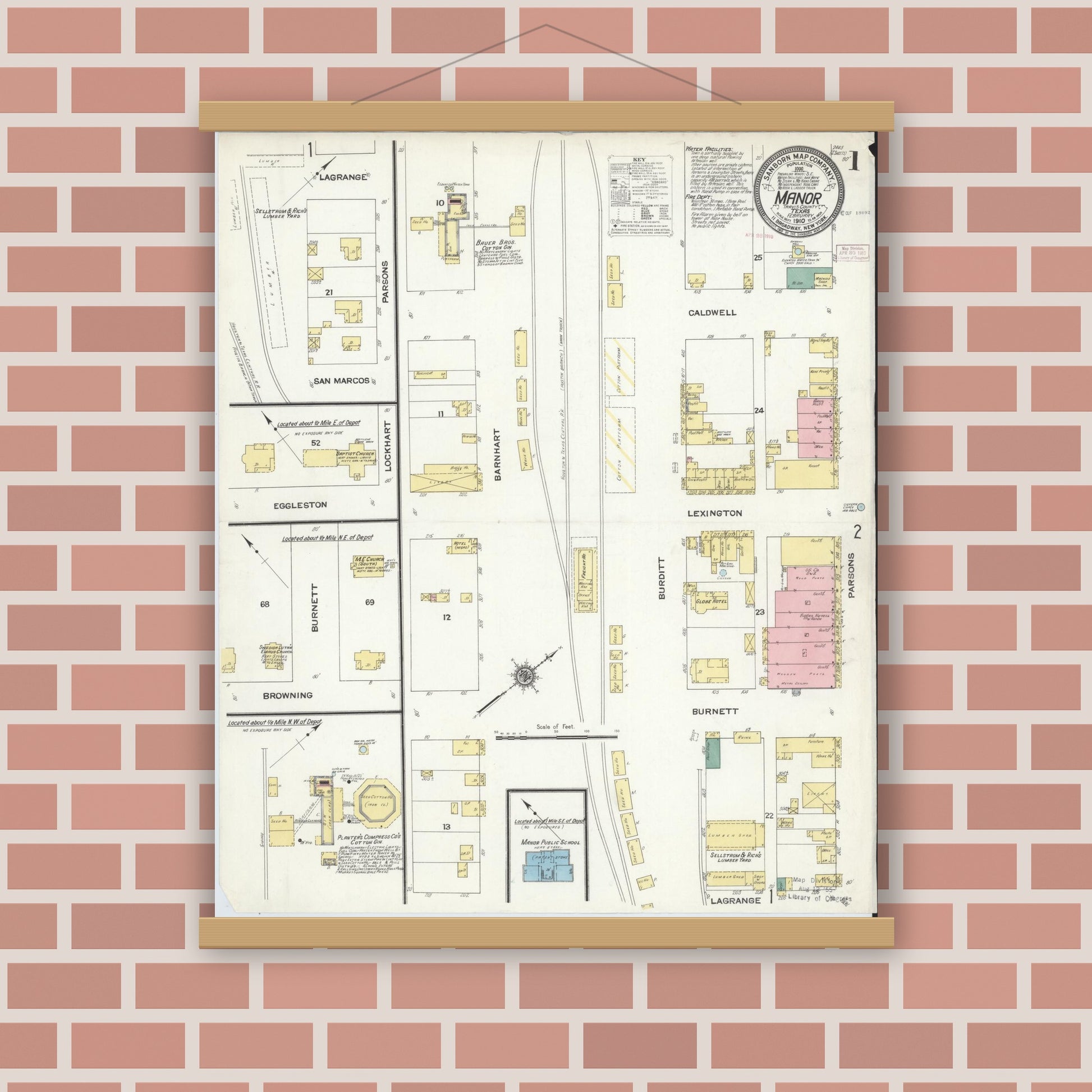 Old map wall art mockup — magnetic wood frame on brick wall — Sanborn Fire Insurance Map from Manor, Travis County, Texas (1910), Sheet #0001
